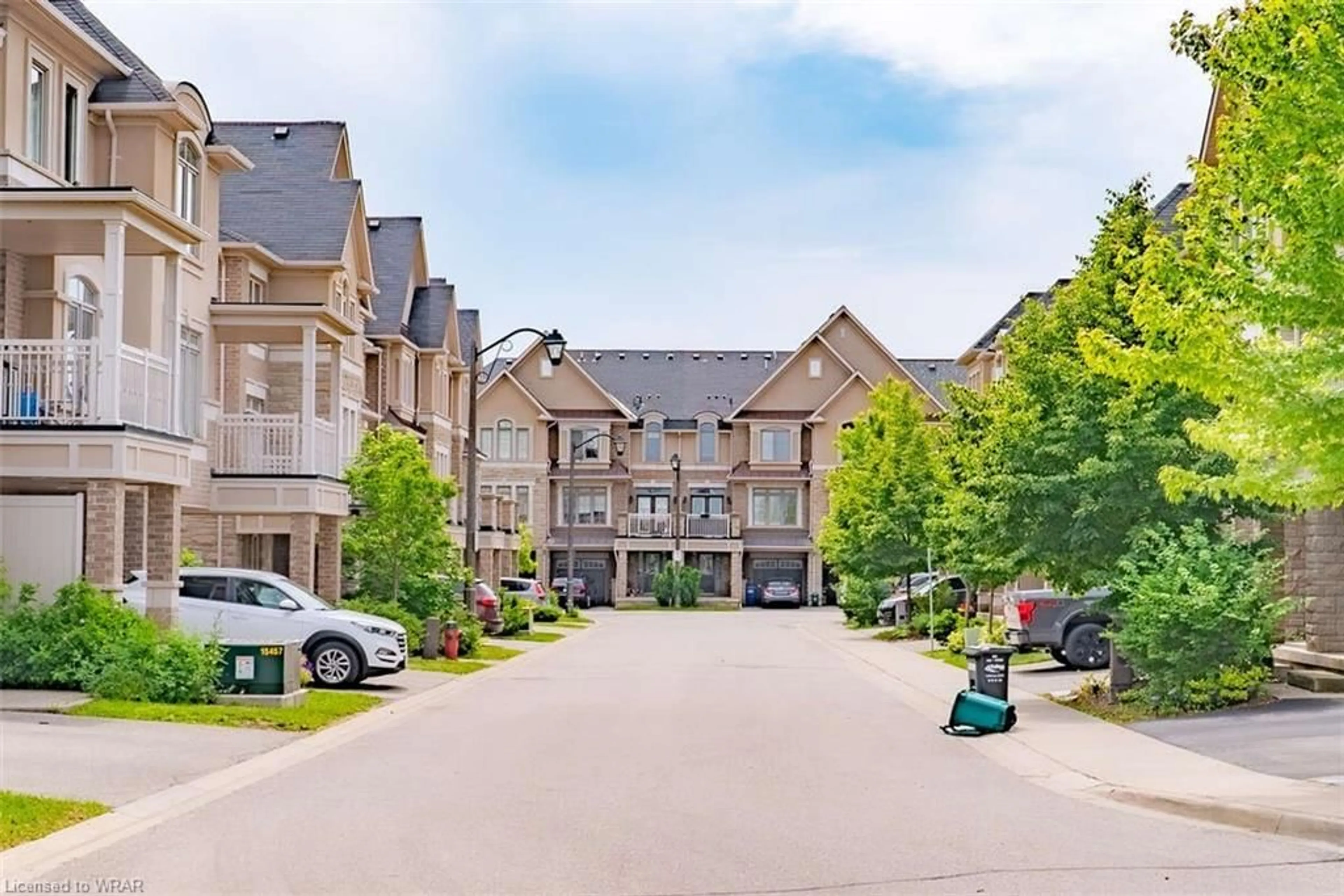 A pic from exterior of the house or condo, the street view for 2435 Greenwich Dr #55, Oakville Ontario L6M 0S4