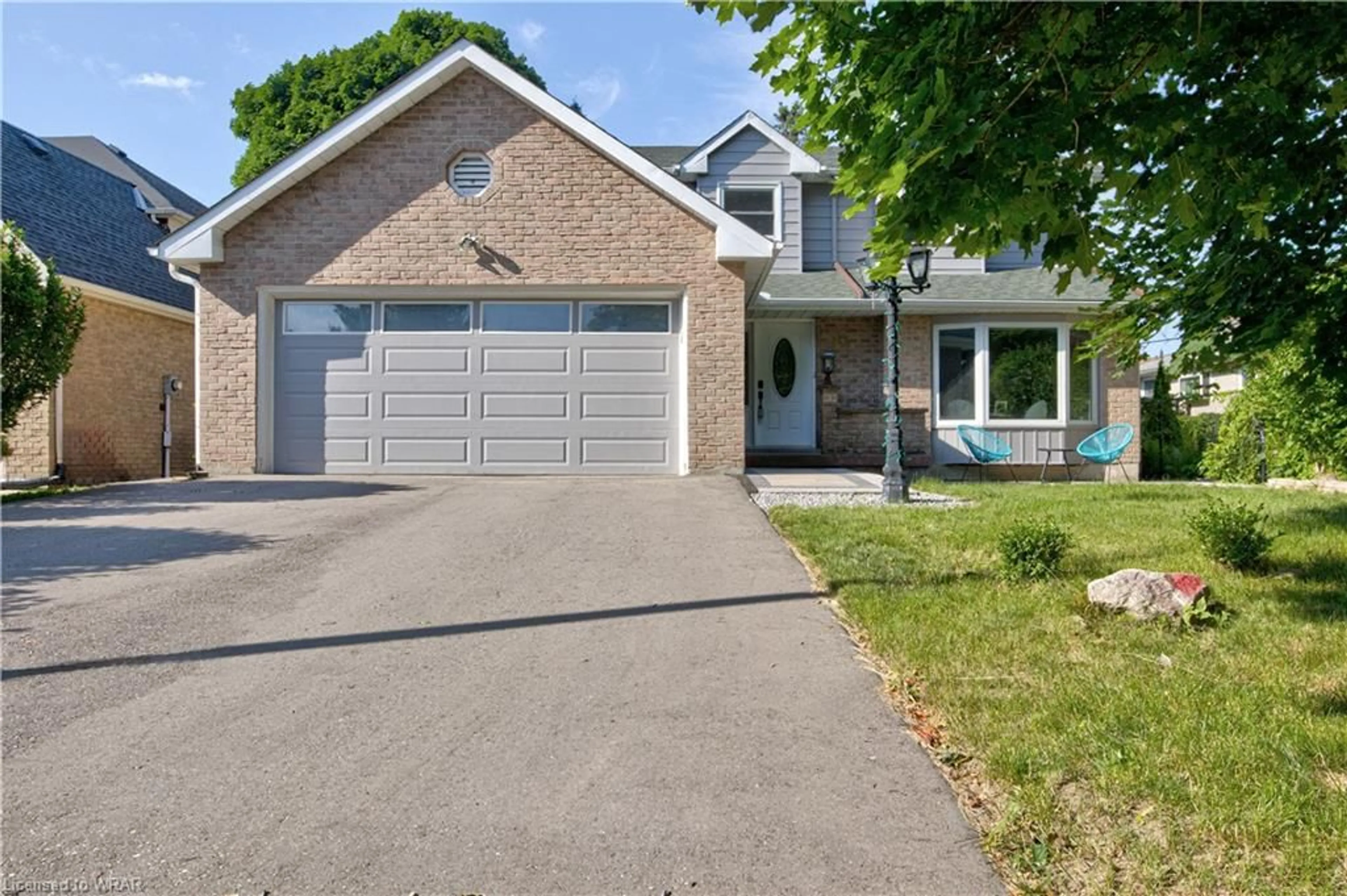 Frontside or backside of a home for 315 Faraday Crt, Waterloo Ontario N2L 6A4
