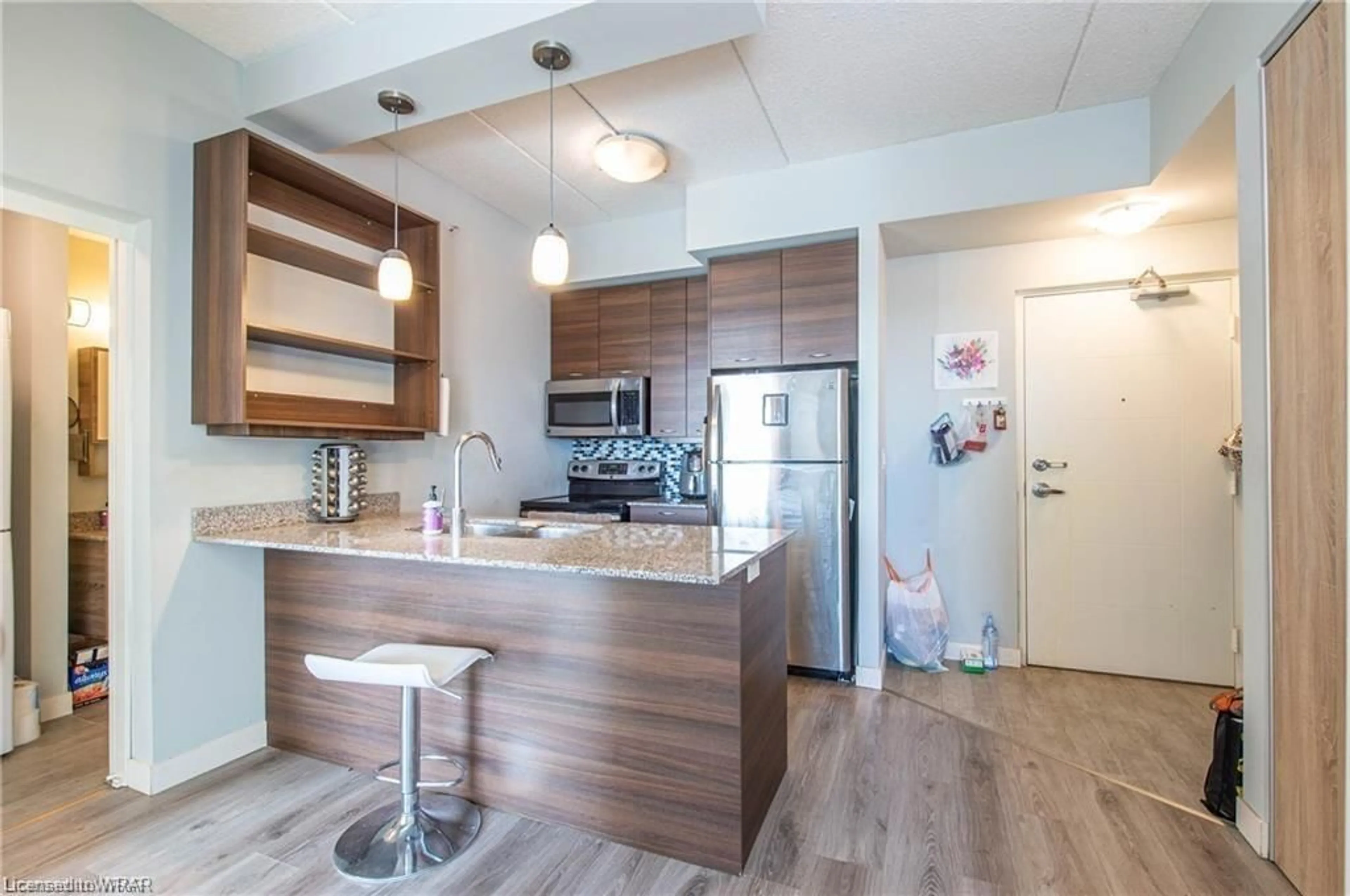 Open concept kitchen for 318 Spruce St #1804, Waterloo Ontario N2L 3M6