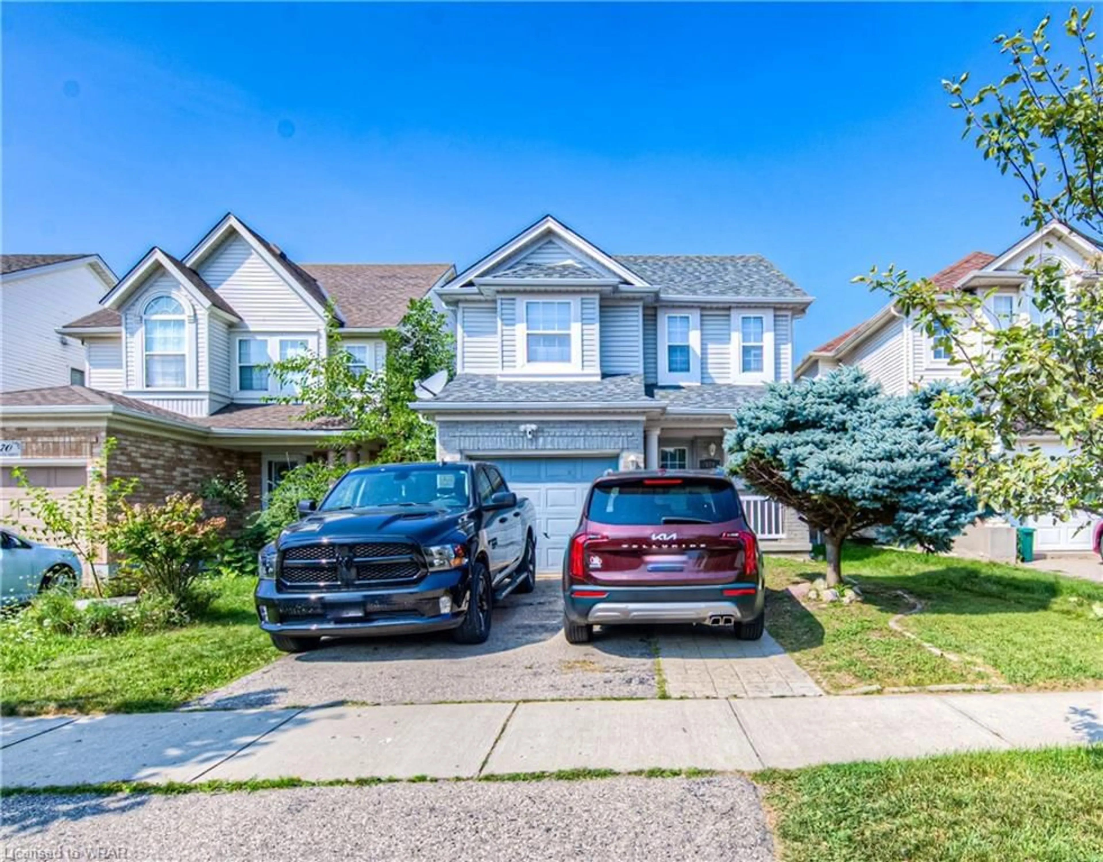 Frontside or backside of a home, the street view for 574 Bonavista Dr, Waterloo Ontario N2K 3Z7