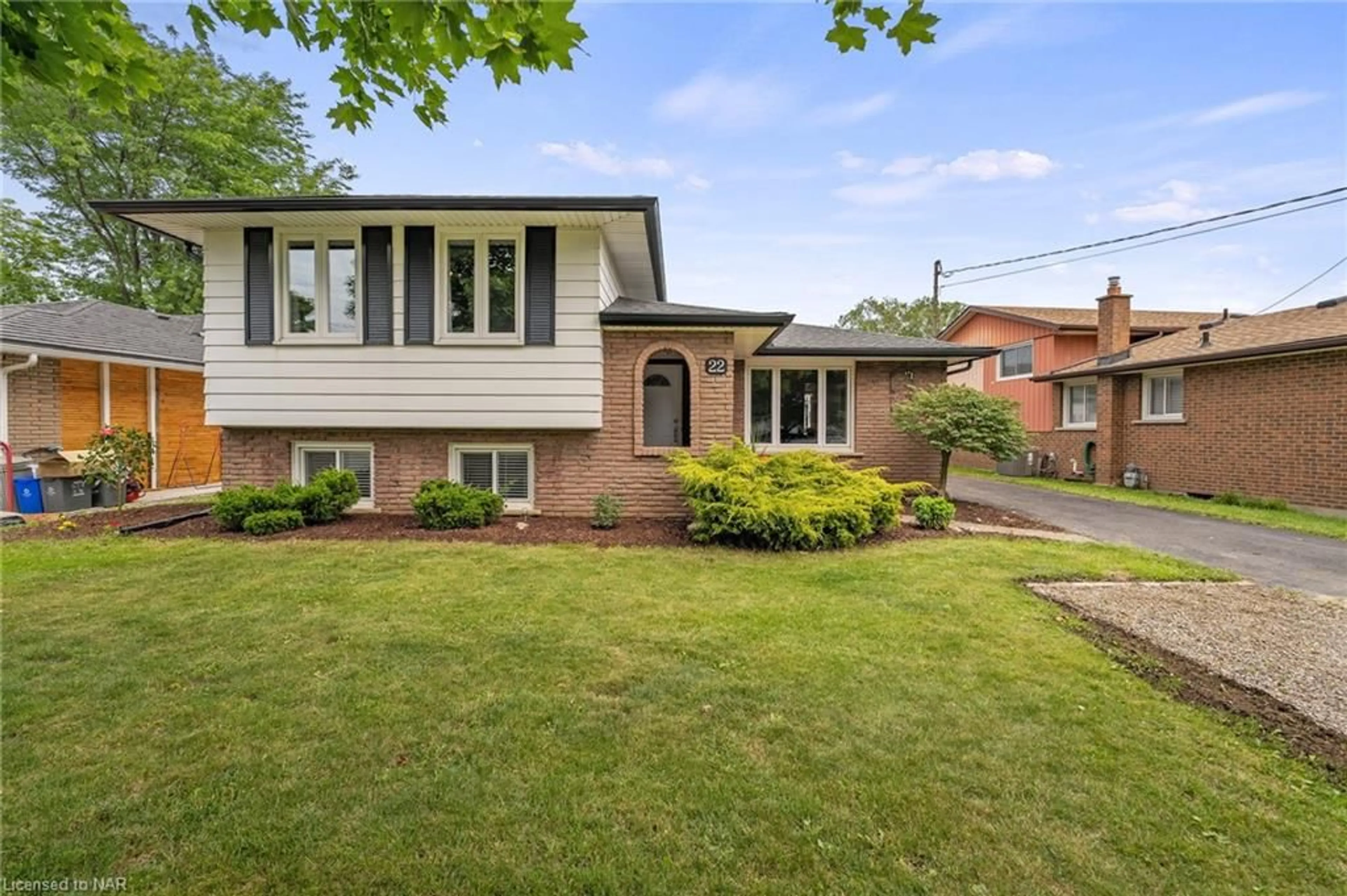 Home with brick exterior material for 22 Sherman Dr, St. Catharines Ontario L2N 2L4