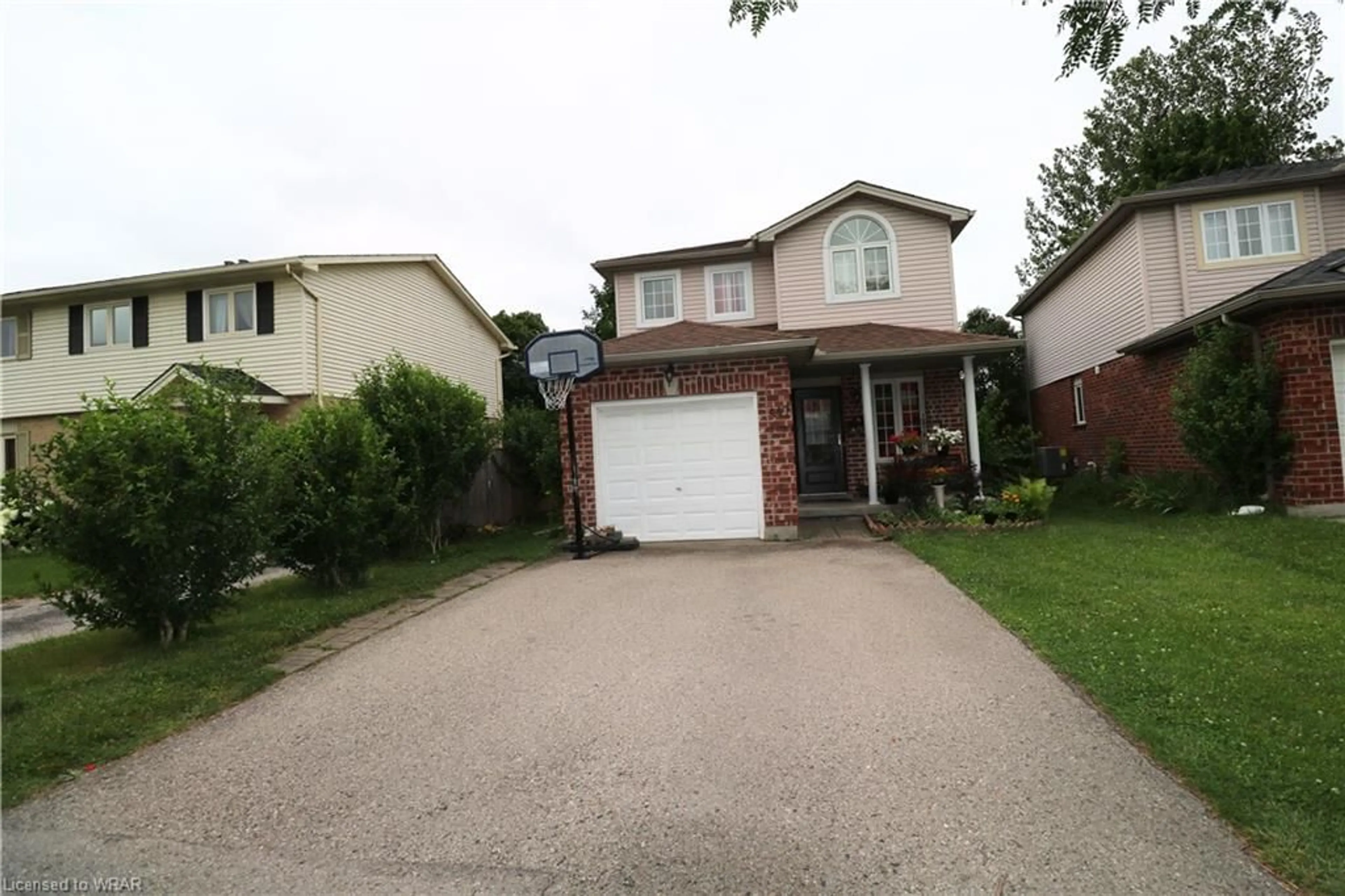 Frontside or backside of a home, the street view for 447 Edenridge Dr, London Ontario N5Y 5T9