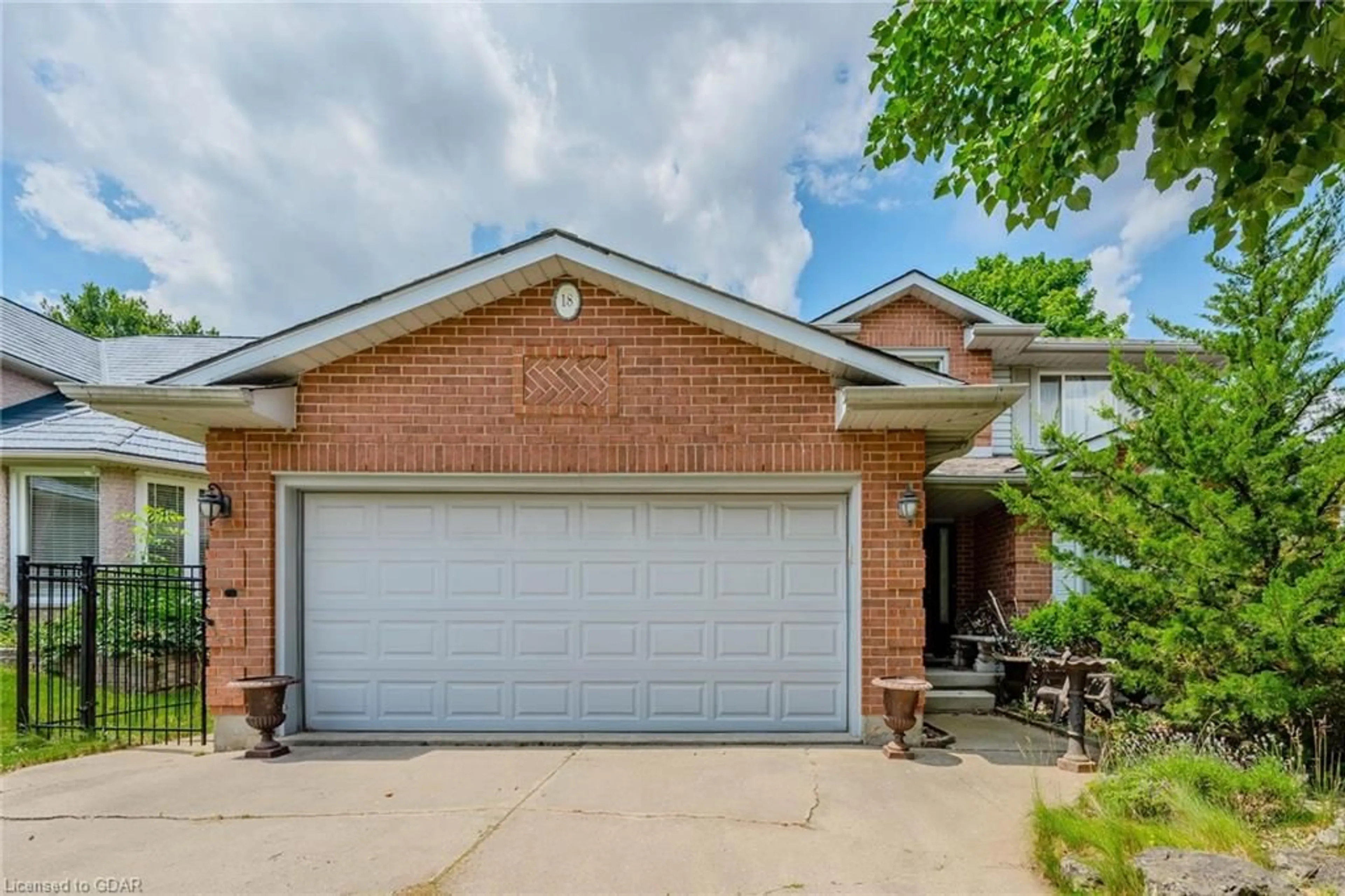 Home with brick exterior material for 18 Cherrywood Dr, Guelph Ontario N1K 1R2