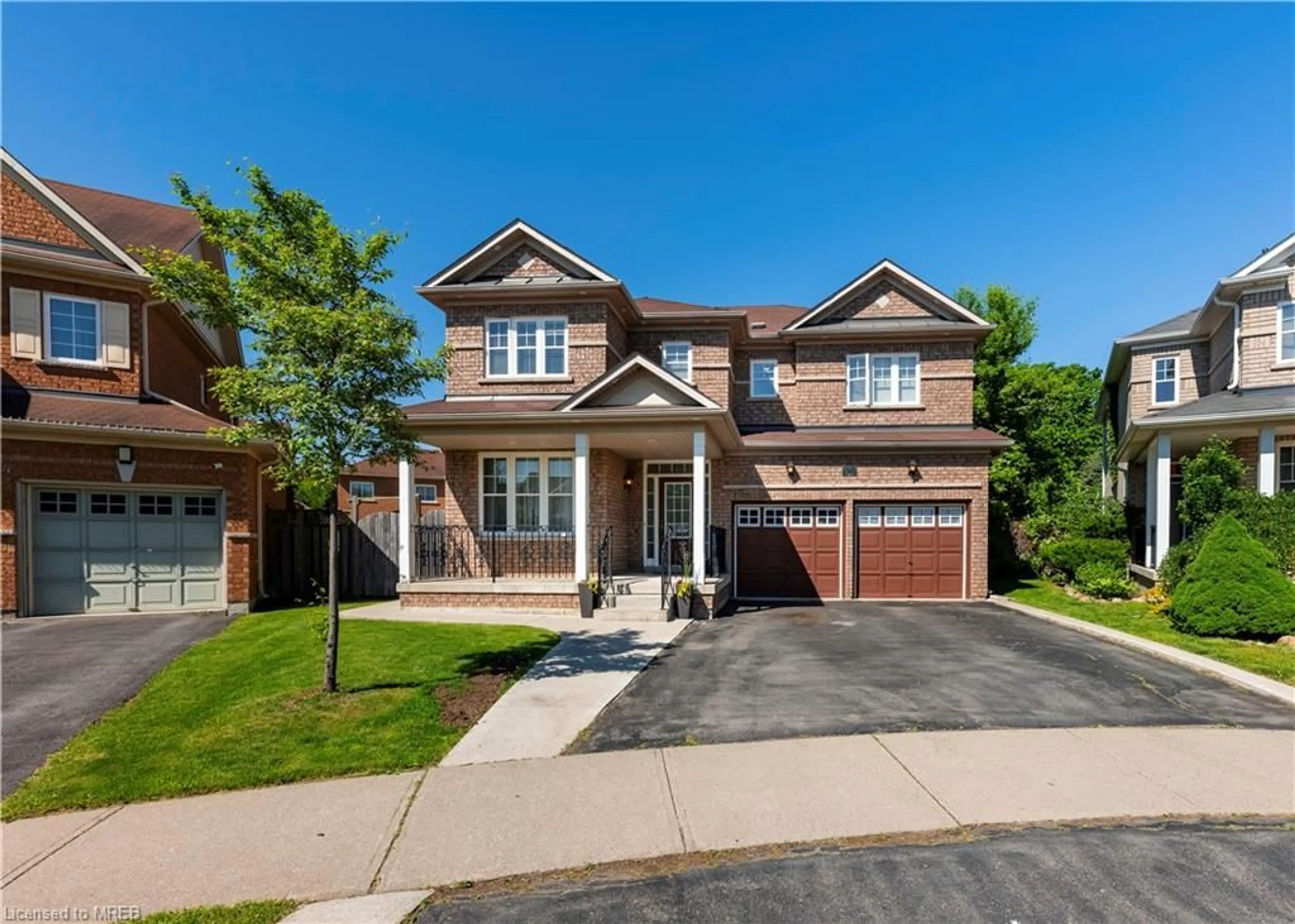 Frontside or backside of a home for 32 Nomad Cres, Brampton Ontario L6Y 5N5