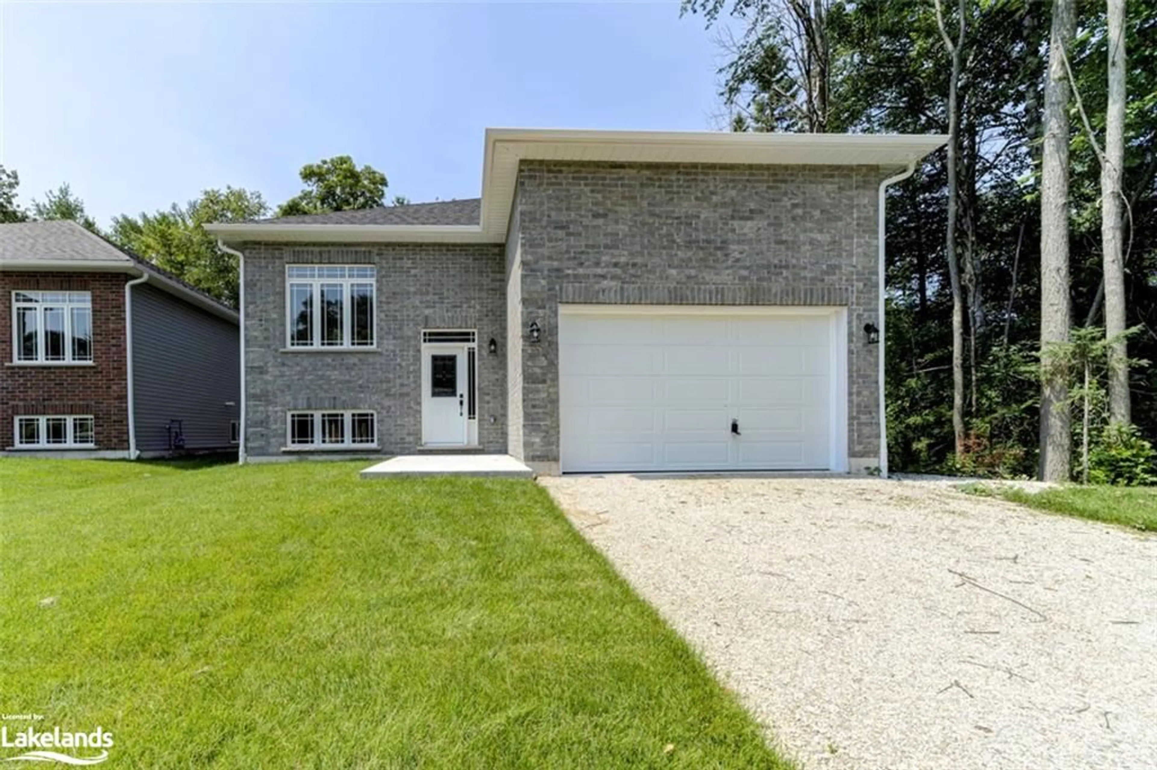 Home with brick exterior material for 12 56th St, Wasaga Beach Ontario L9Z 1W5