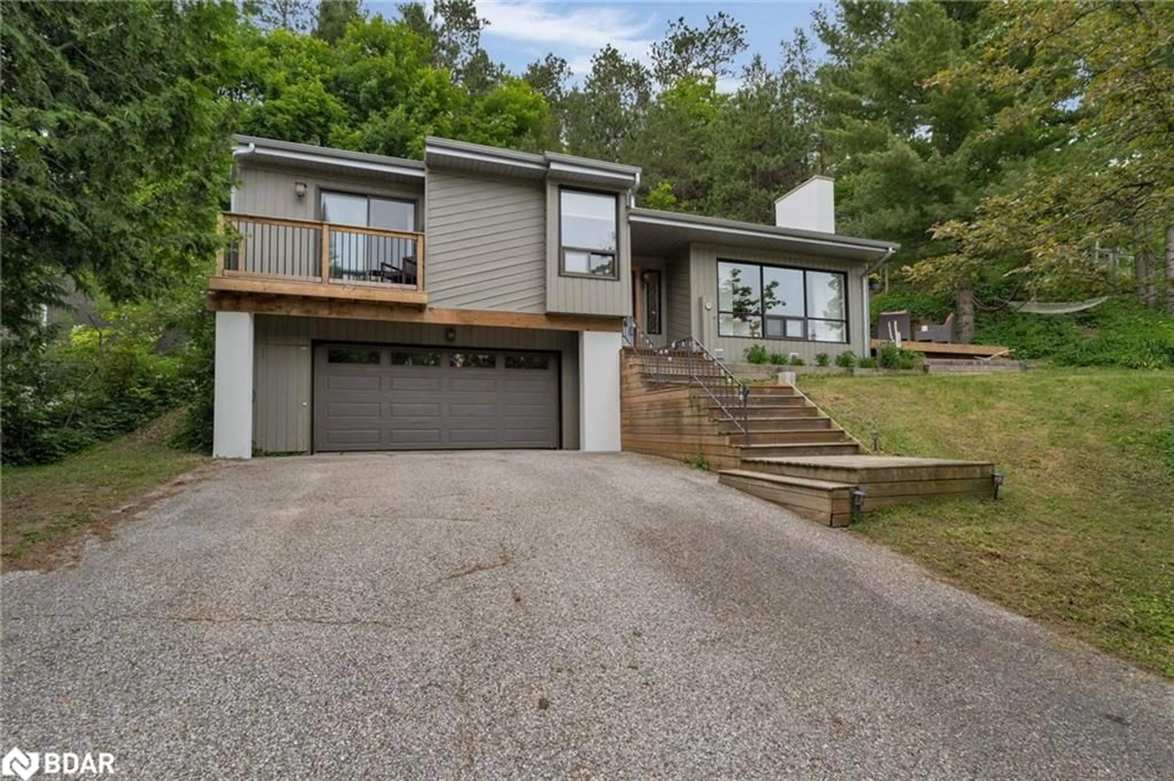 Frontside or backside of a home for 8 Pine Spring Rd, Horseshoe Valley Ontario L4M 4Y8