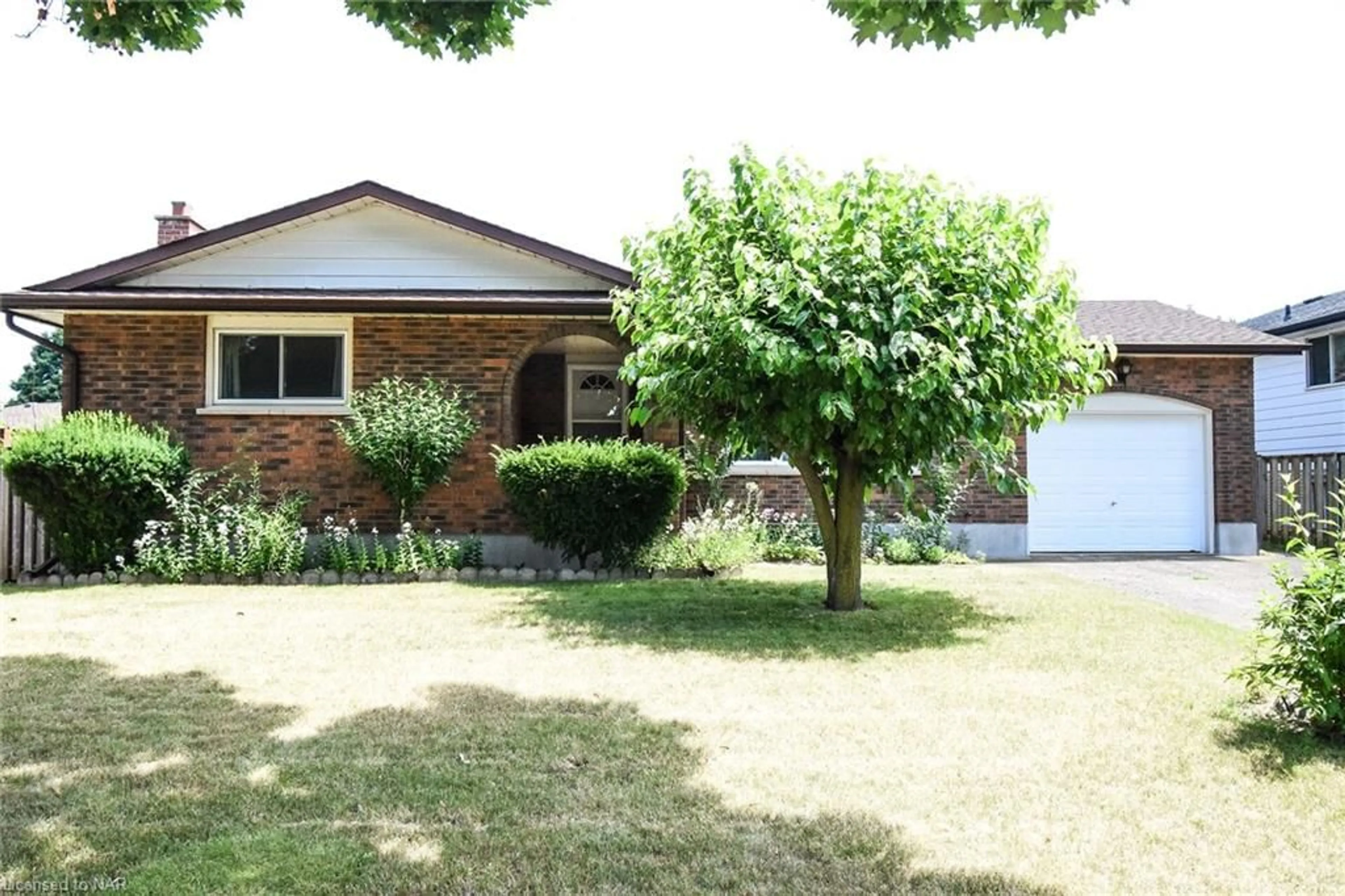 Frontside or backside of a home for 24 Shade Tree Cres, St. Catharines Ontario L2M 7G5