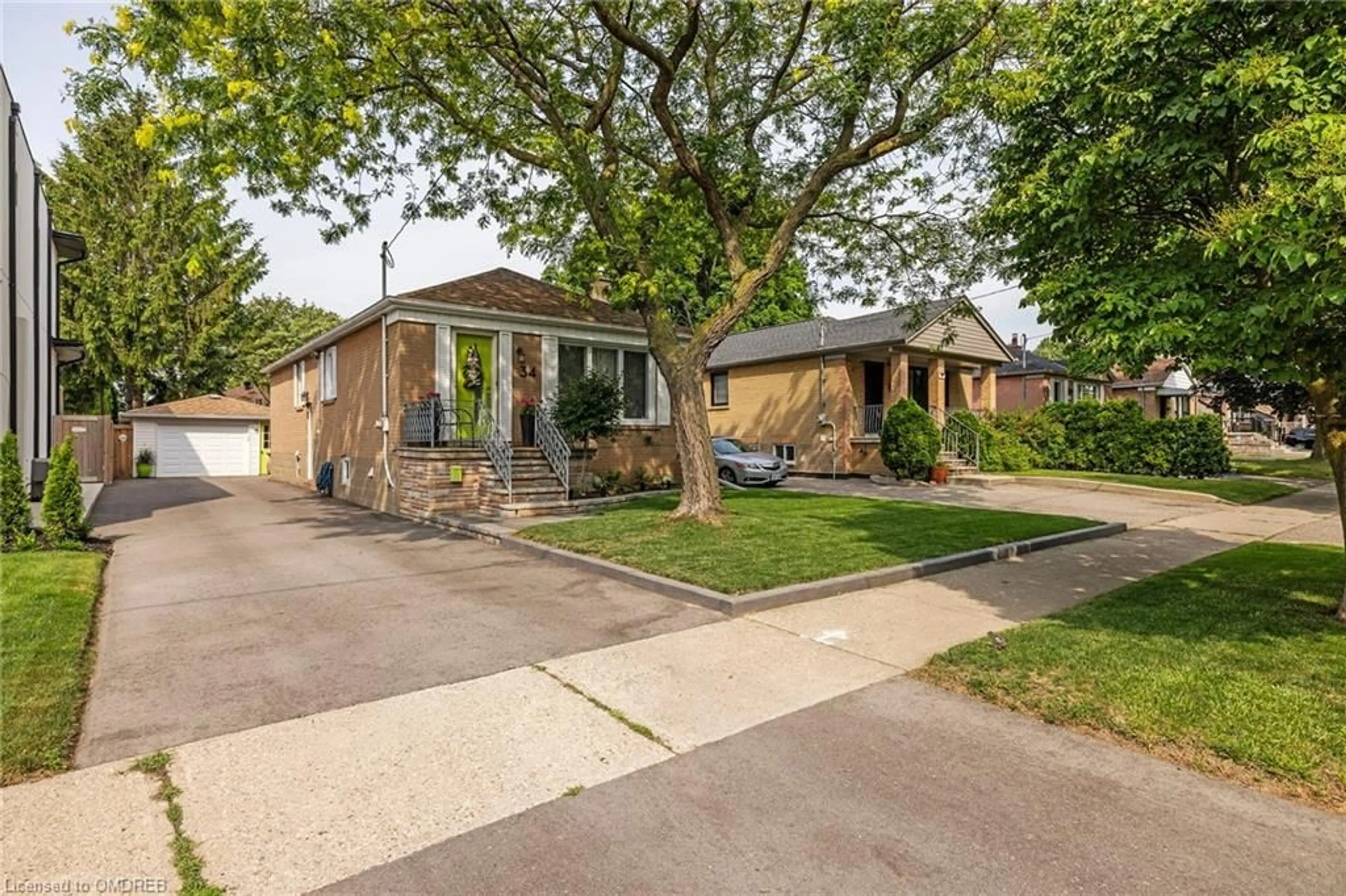 Frontside or backside of a home for 34 Trueman Ave, Etobicoke Ontario M8Z 5A2