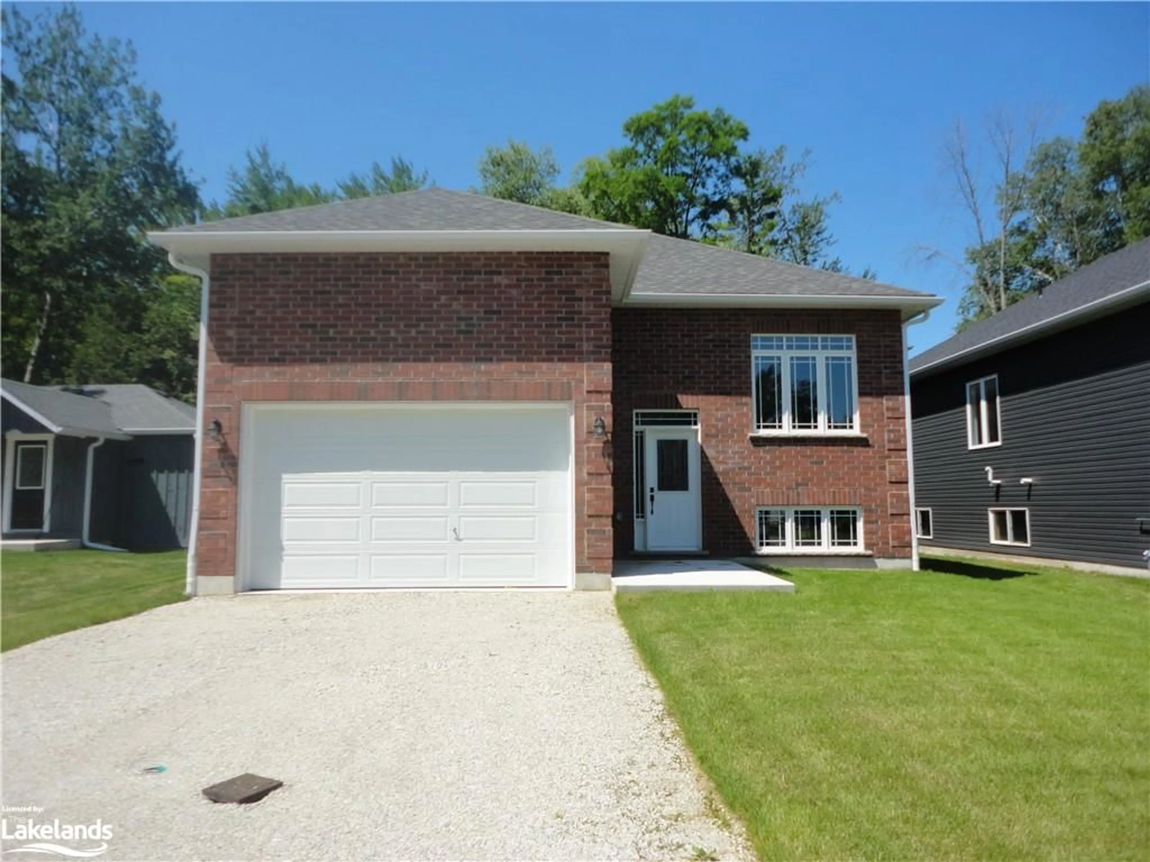 Home with brick exterior material for 14 56th St, Wasaga Beach Ontario L9Z 1W5