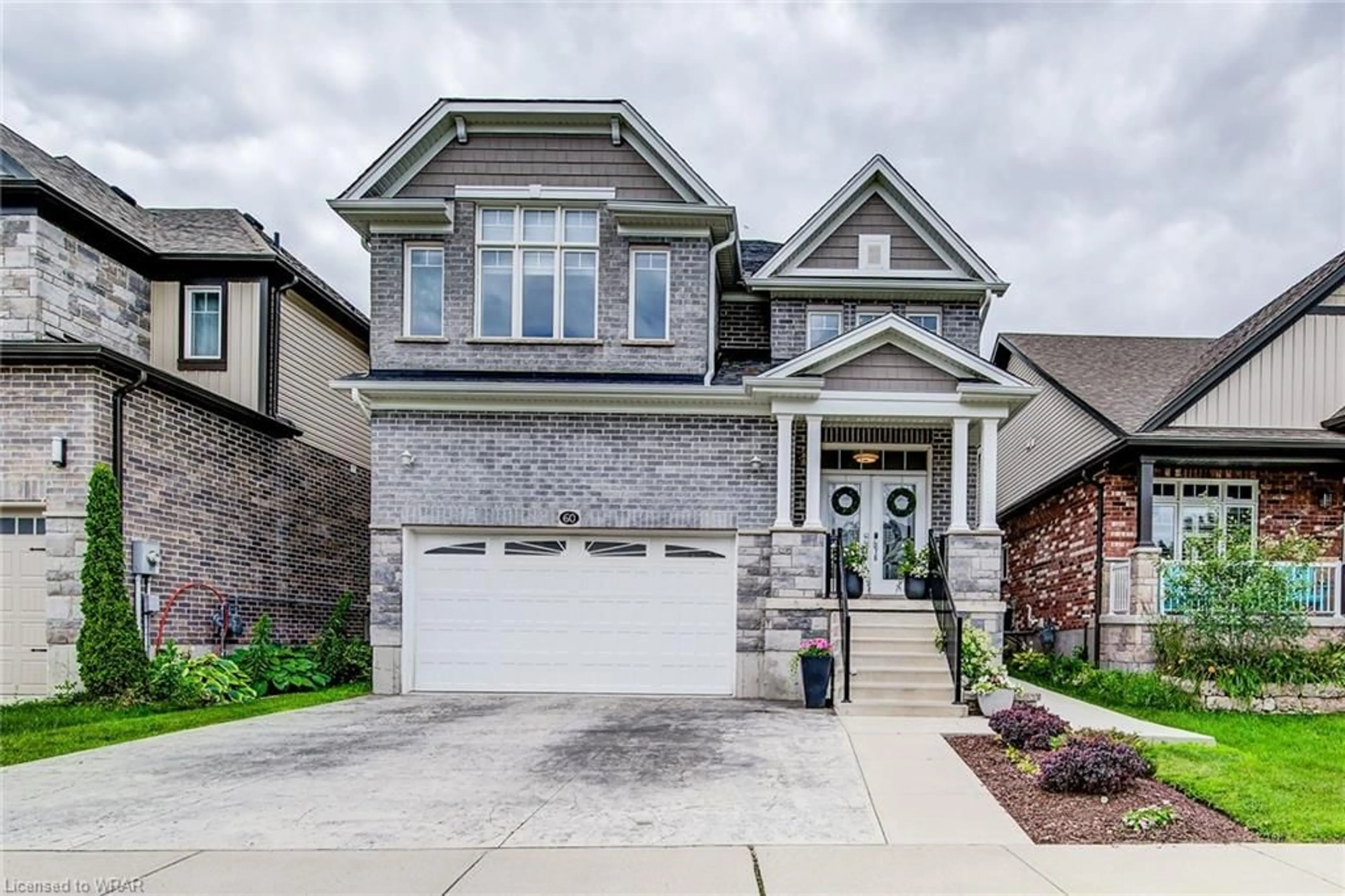 Home with brick exterior material for 60 Fraserwood Crt, Cambridge Ontario N1S 0B3