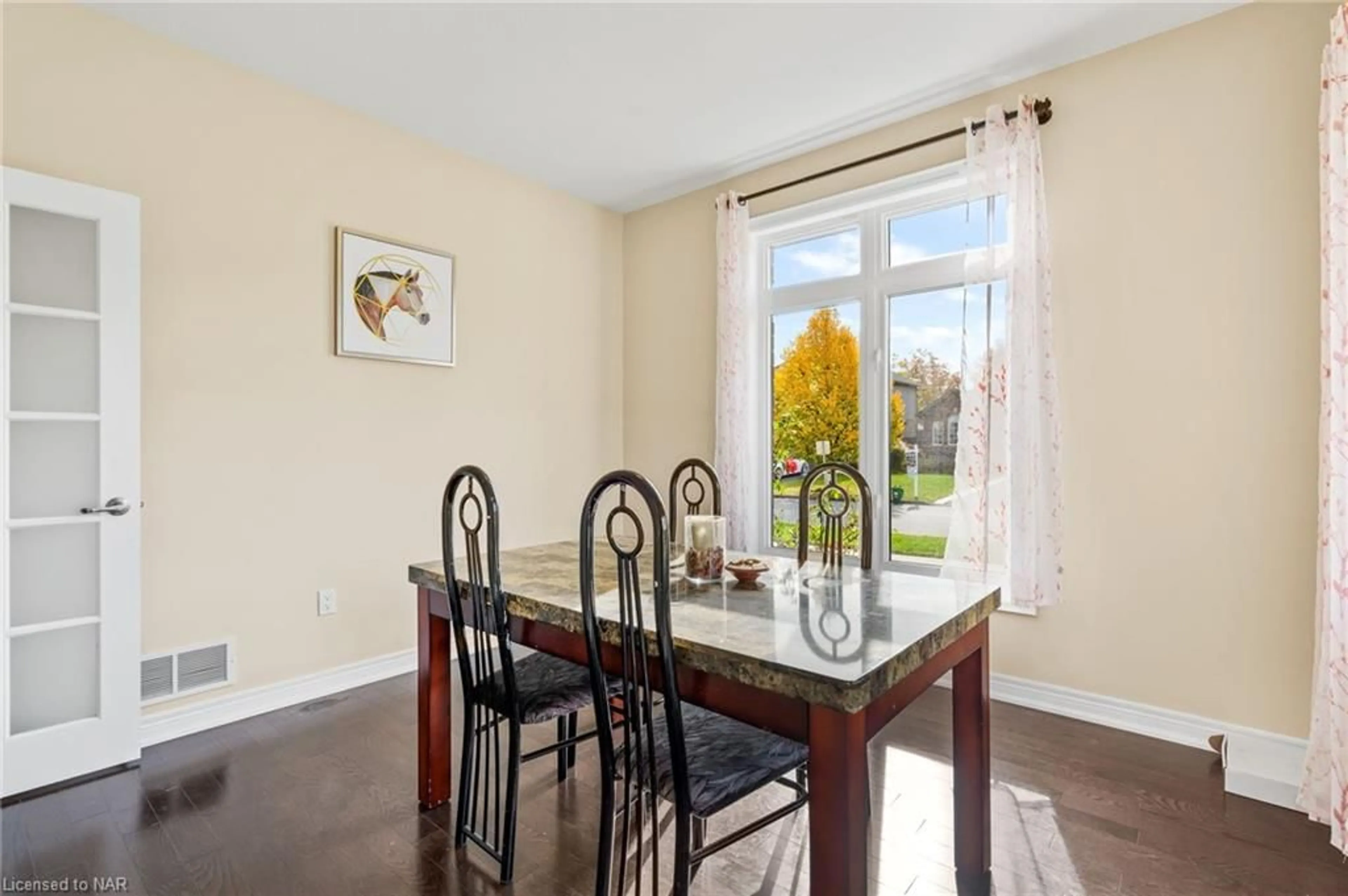 Dining room, wood floors, cottage for 4037 Bush Cres, Beamsville Ontario L3J 0H2