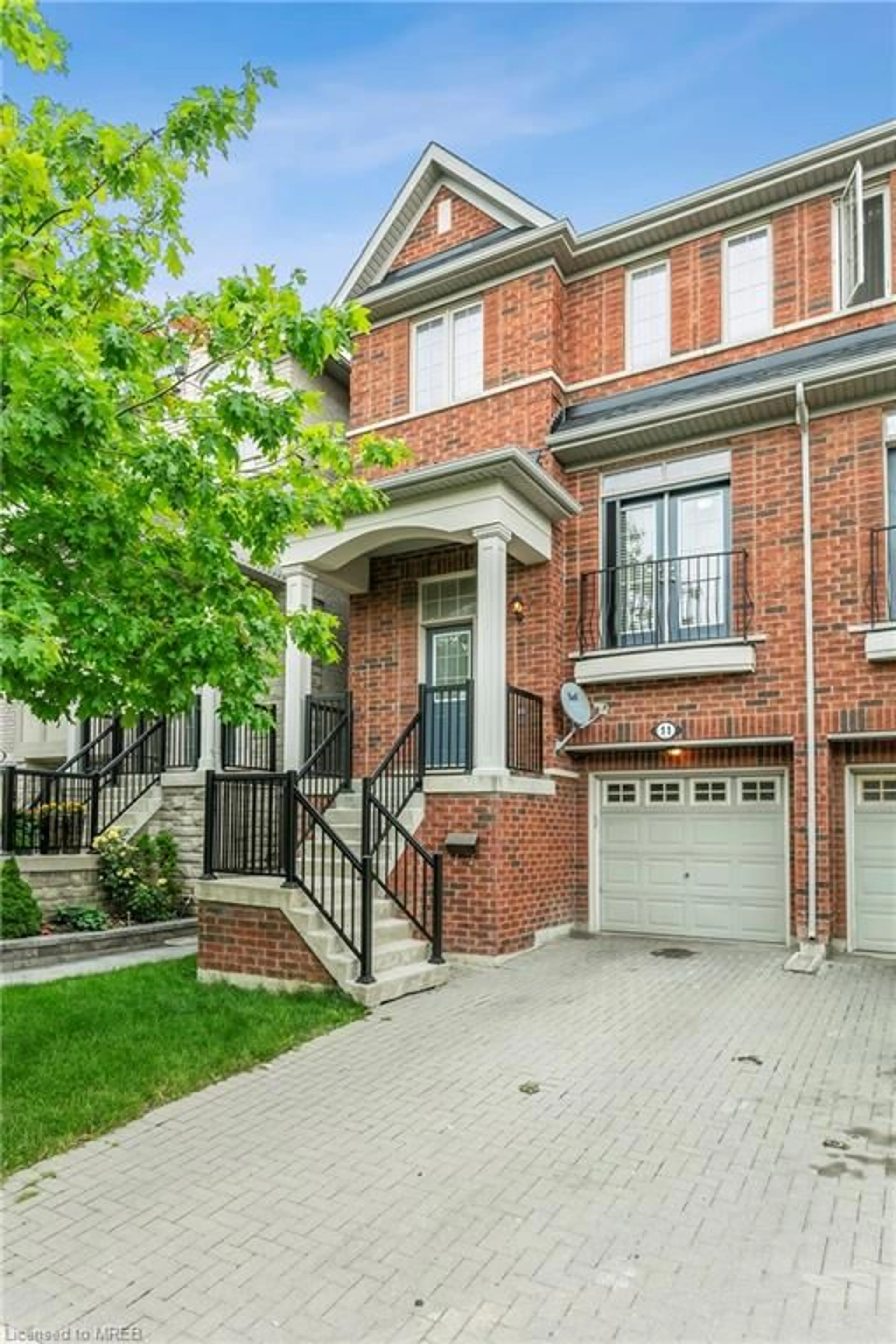 Home with brick exterior material for 11 Abraham Welsh Road Rd, Toronto Ontario M9M 0B7