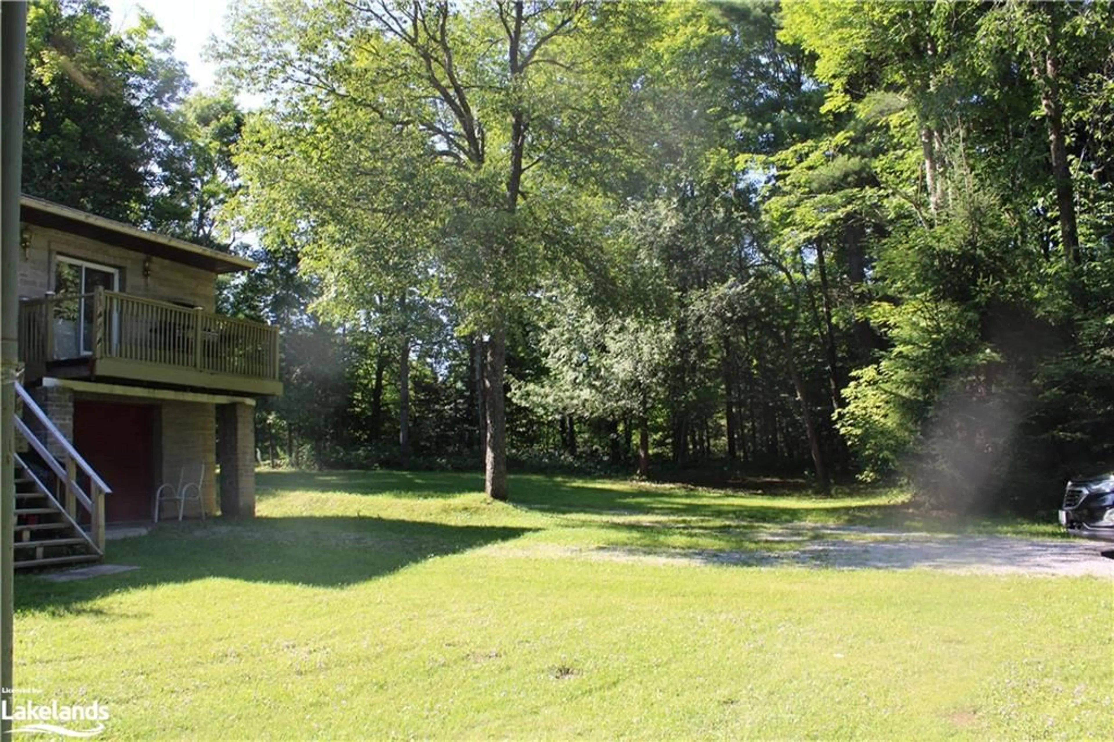 Patio, the fenced backyard for 1200 Glamor Lake Rd, Gooderham Ontario K0M 1R0