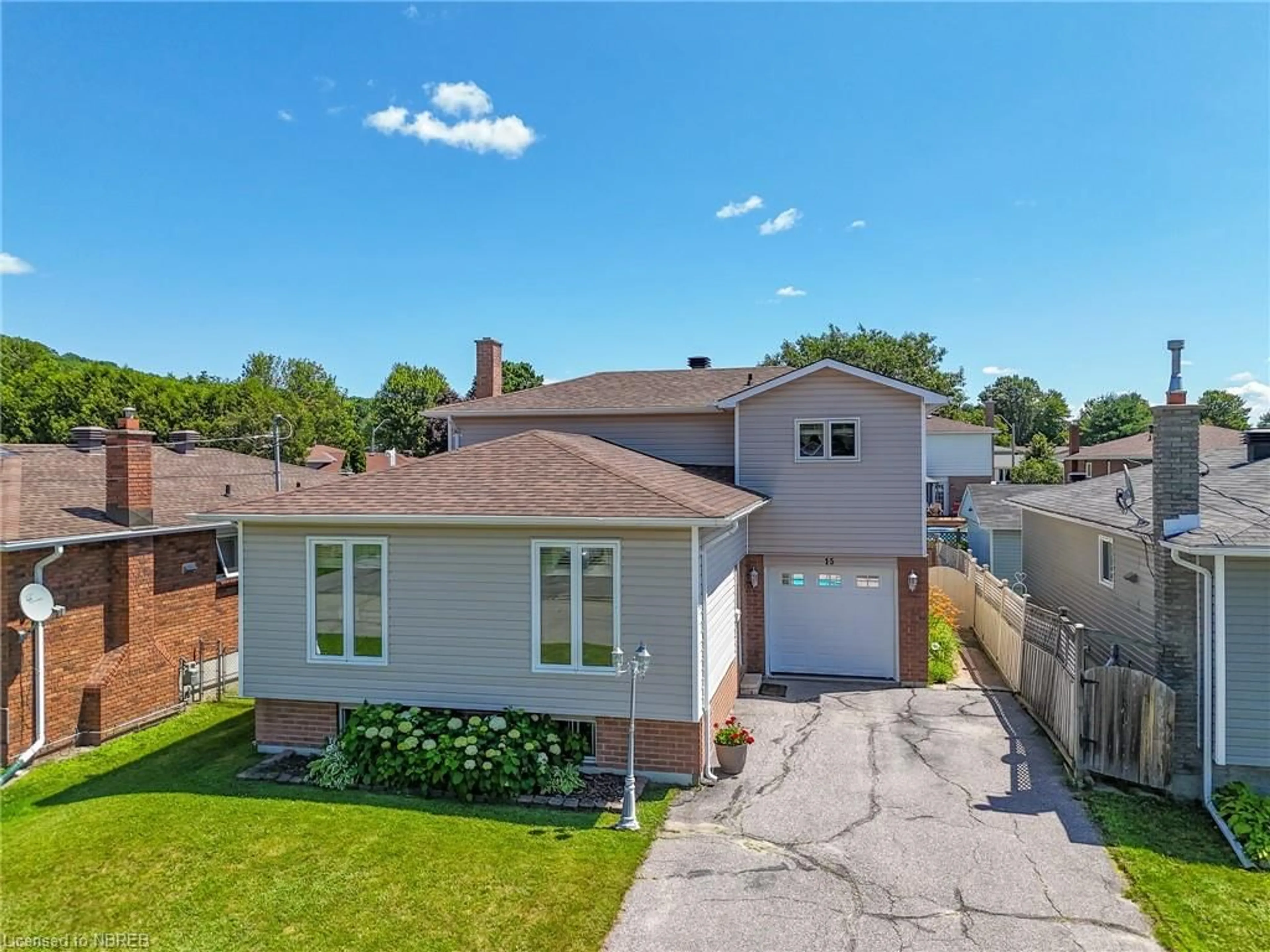 Frontside or backside of a home for 15 Belleview Cres, North Bay Ontario P1B 8V2