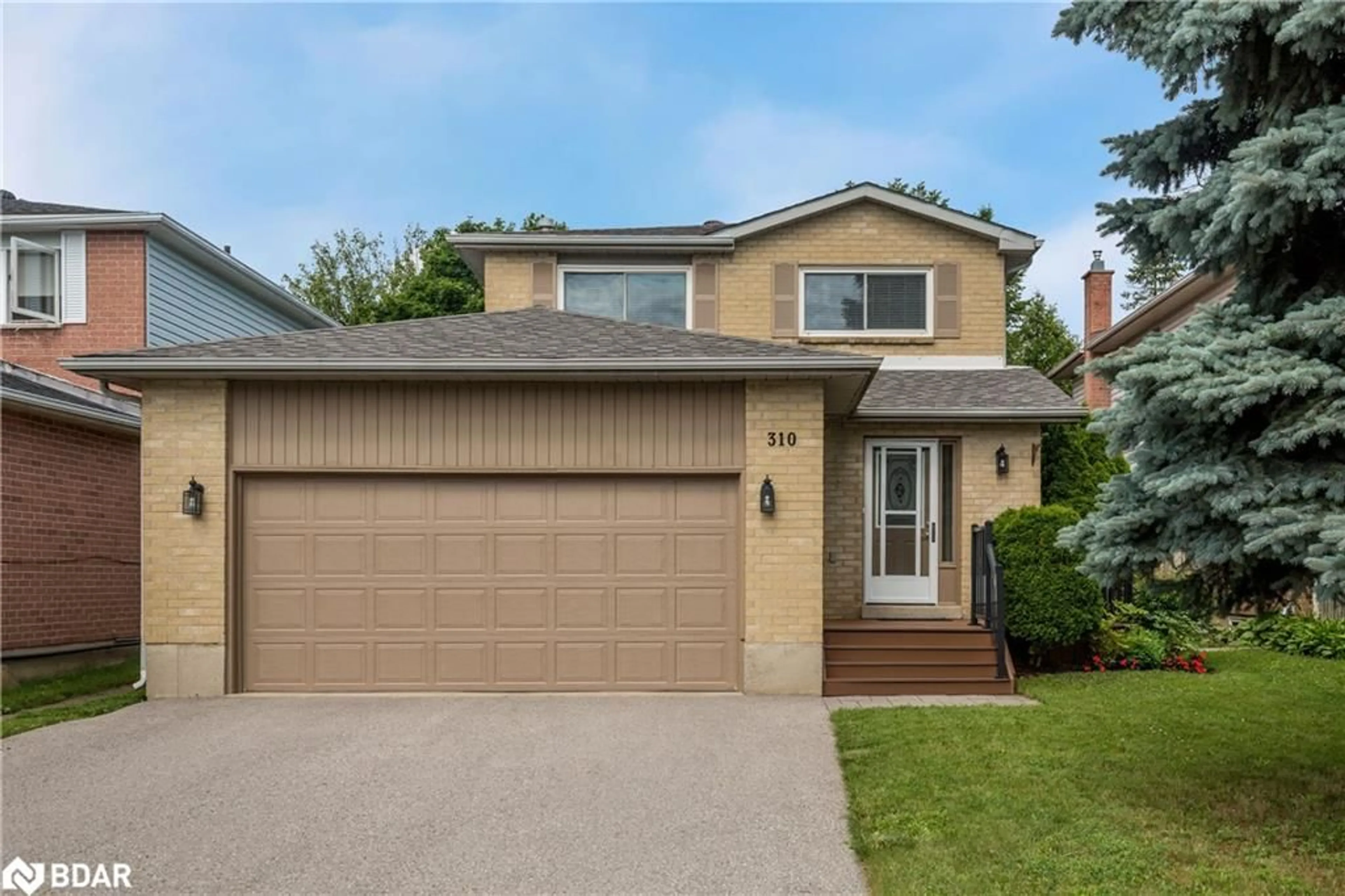 Frontside or backside of a home for 310 Hickling Trail, Barrie Ontario L4M 5X9