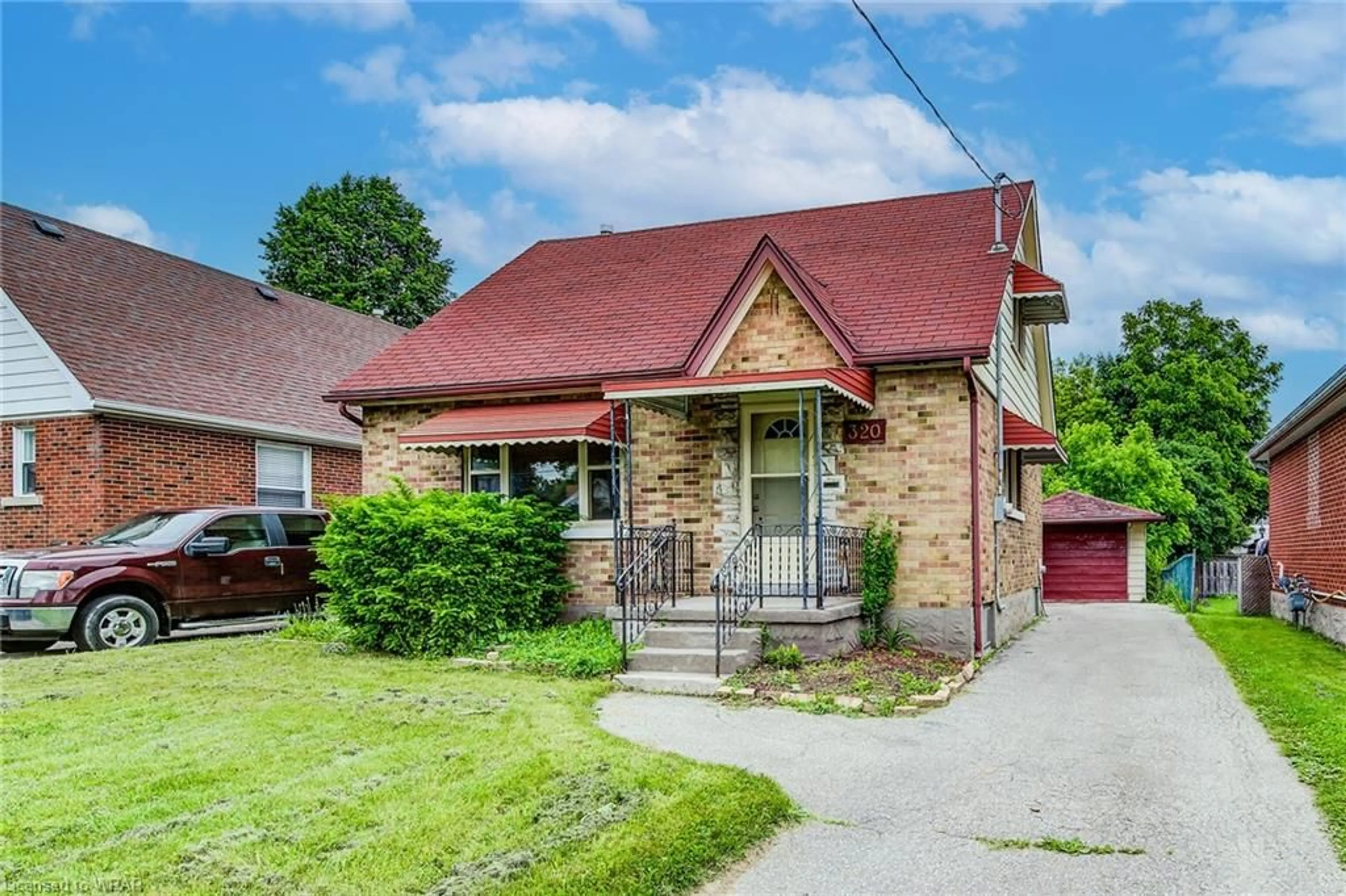 Frontside or backside of a home for 320 Highland Rd, Kitchener Ontario N2M 3W4