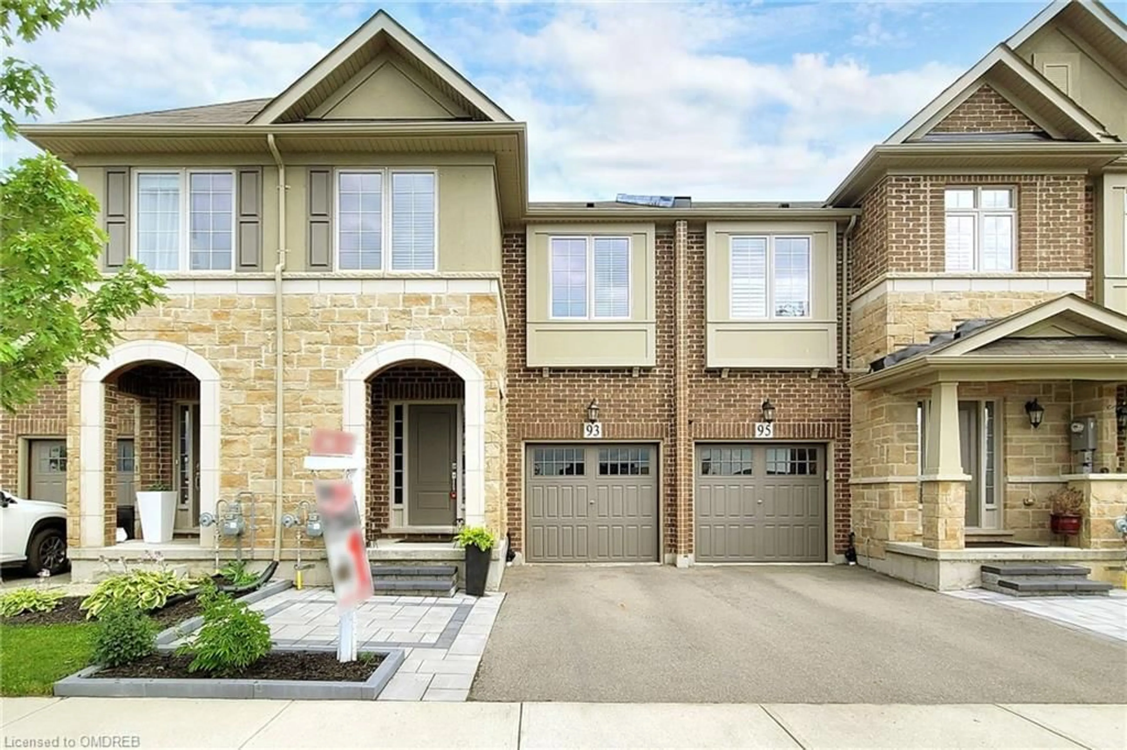Home with brick exterior material for 93 Tasker Court Crt, Milton Ontario L9E 1B9