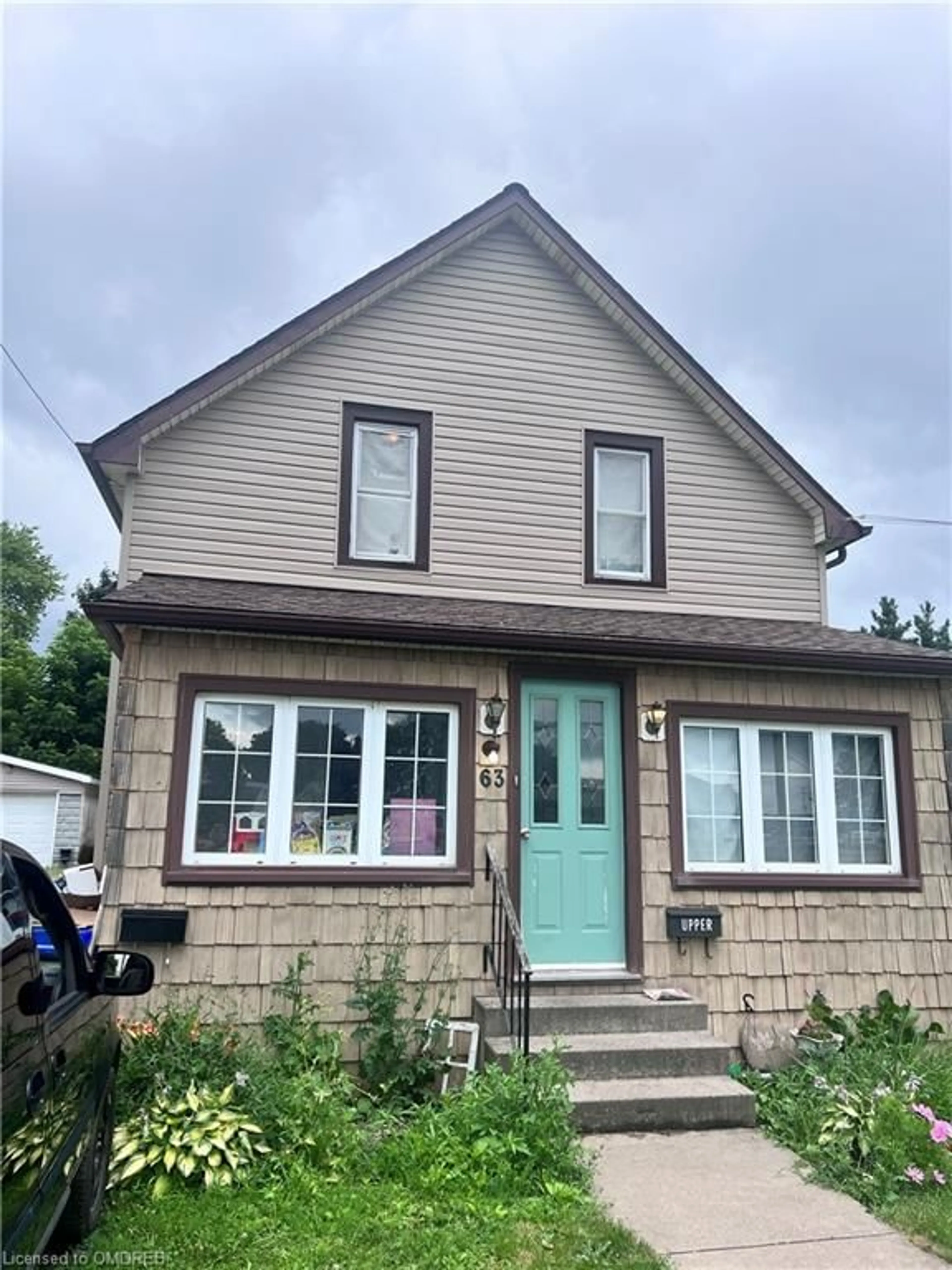 Frontside or backside of a home for 63 Dolphin St, Port Colborne Ontario L3K 2J4