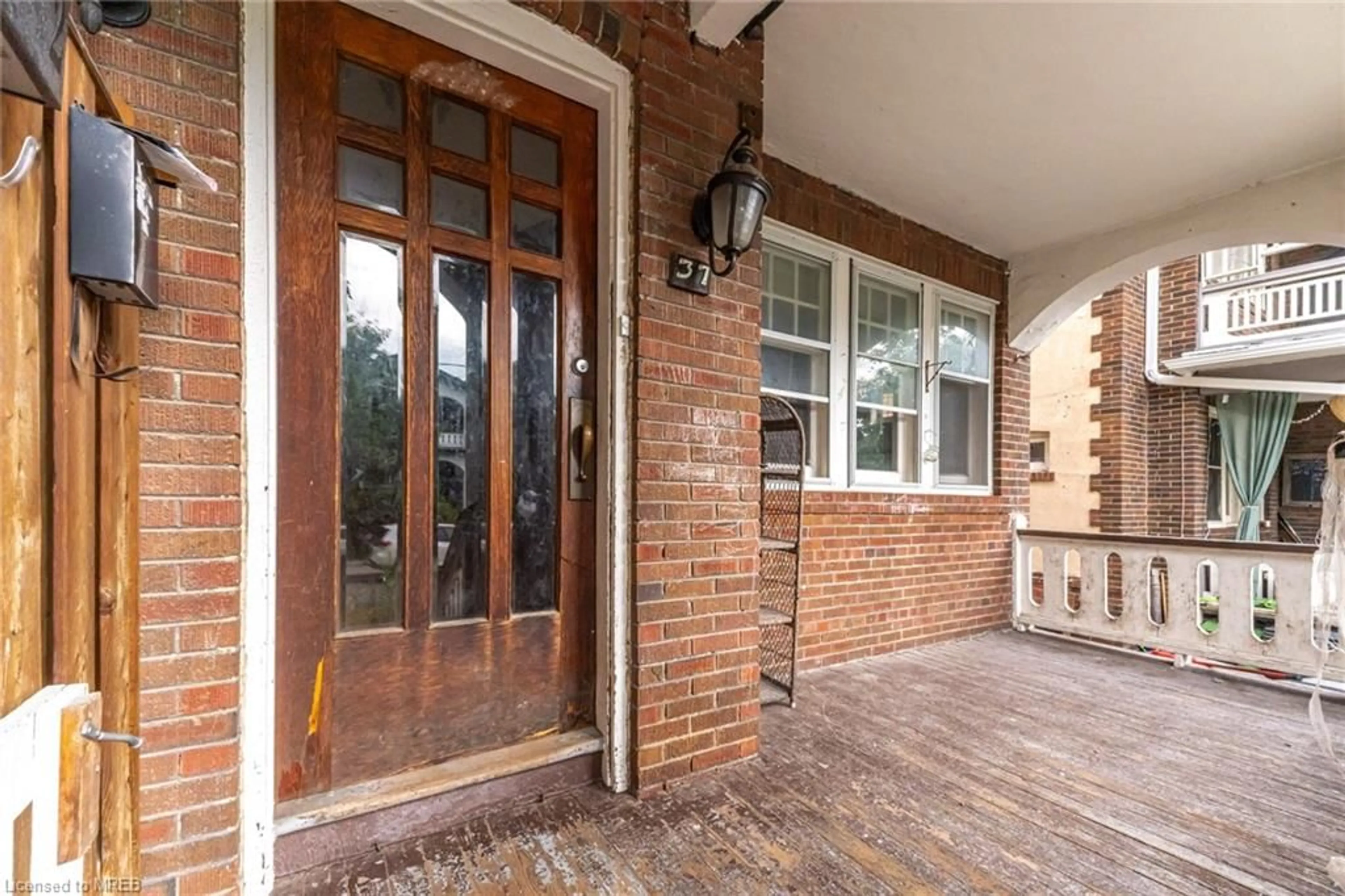 Home with brick exterior material for 37 Wineva Ave, Toronto Ontario M4E 2T1