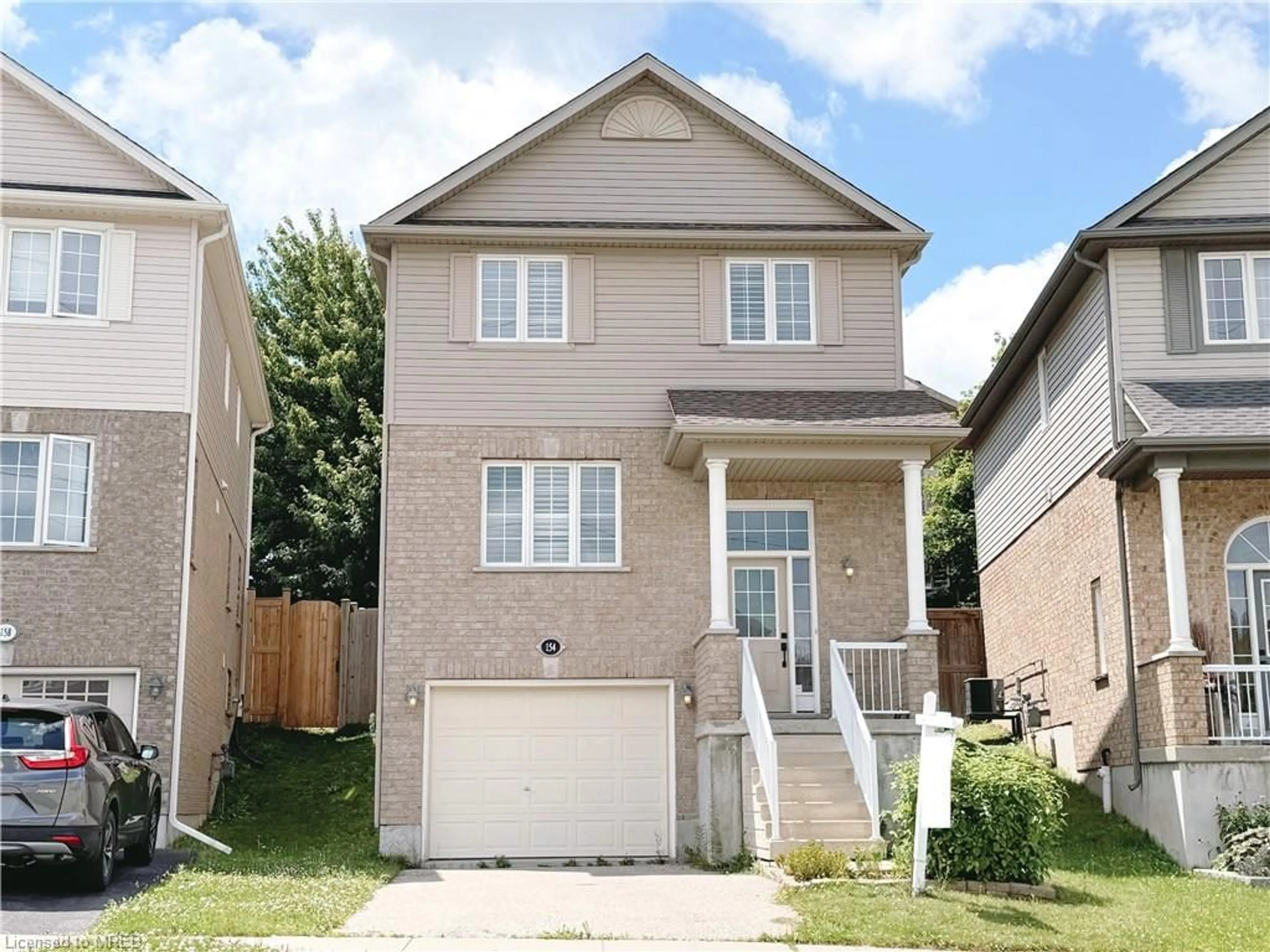 Frontside or backside of a home for 154 Newcastle Dr, Kitchener Ontario N2R 1W4