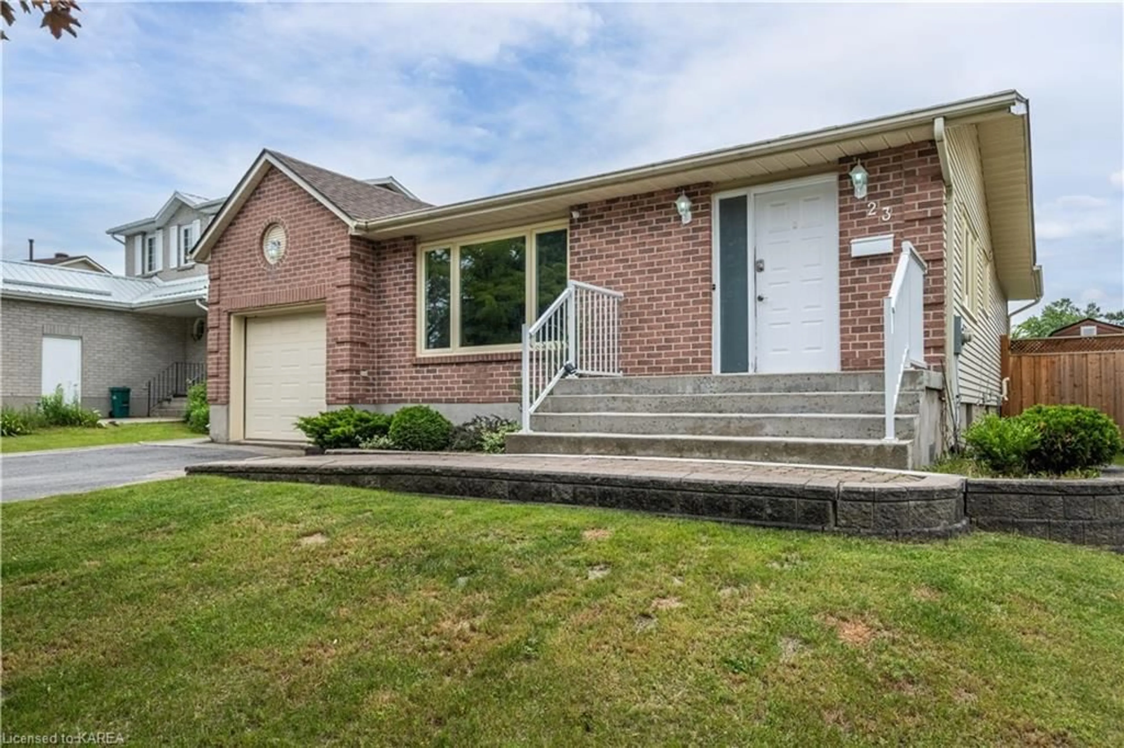 Home with brick exterior material for 23 Douglas Ave, Kingston Ontario K7K 6B5
