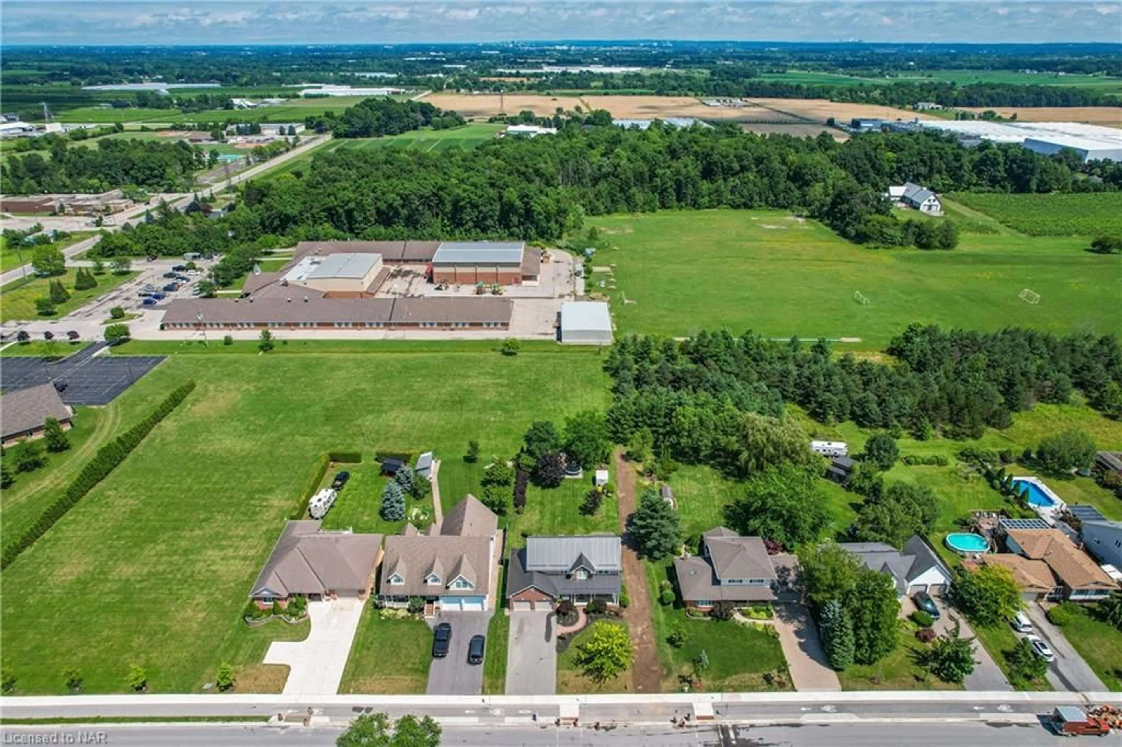 Frontside or backside of a home, the fenced backyard for 3869 19th St, Jordan Ontario L0R 1S0