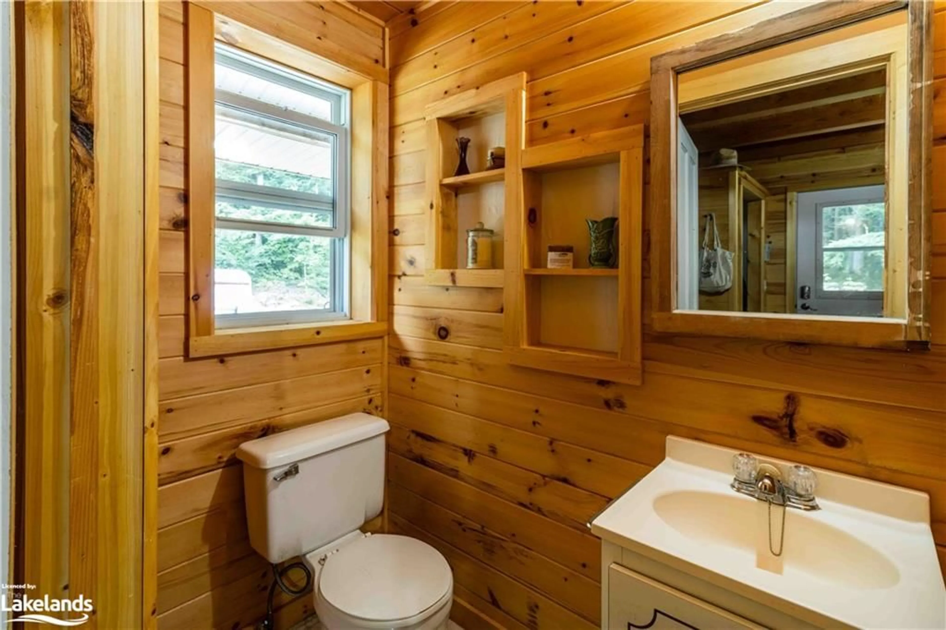 Standard bathroom, wood floors for 1532 Braeloch Rd, Algonquin Highlands Ontario K0M 1S0