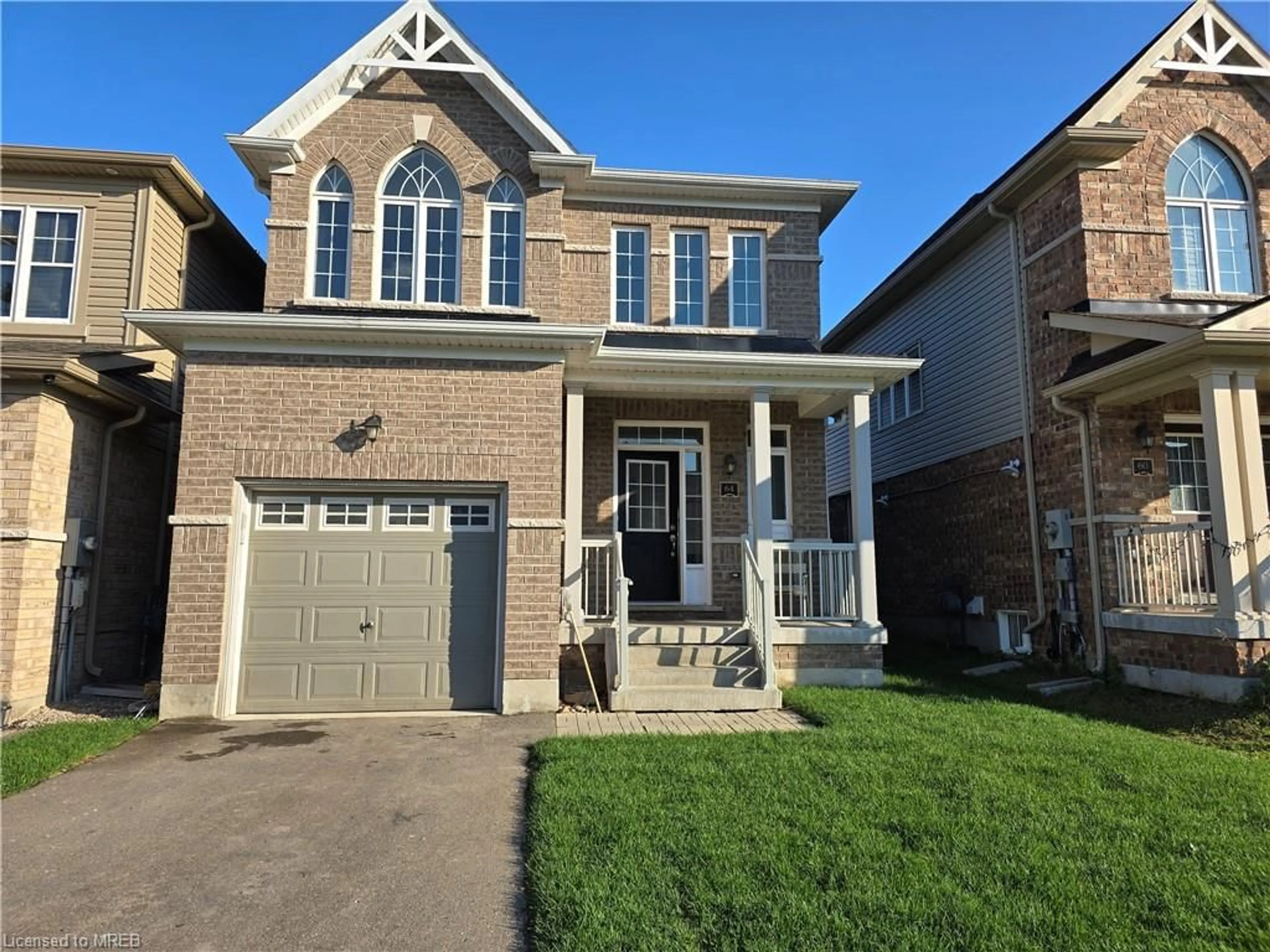 Home with brick exterior material for 64 Mullholland Ave, Cambridge Ontario N3H 0C2