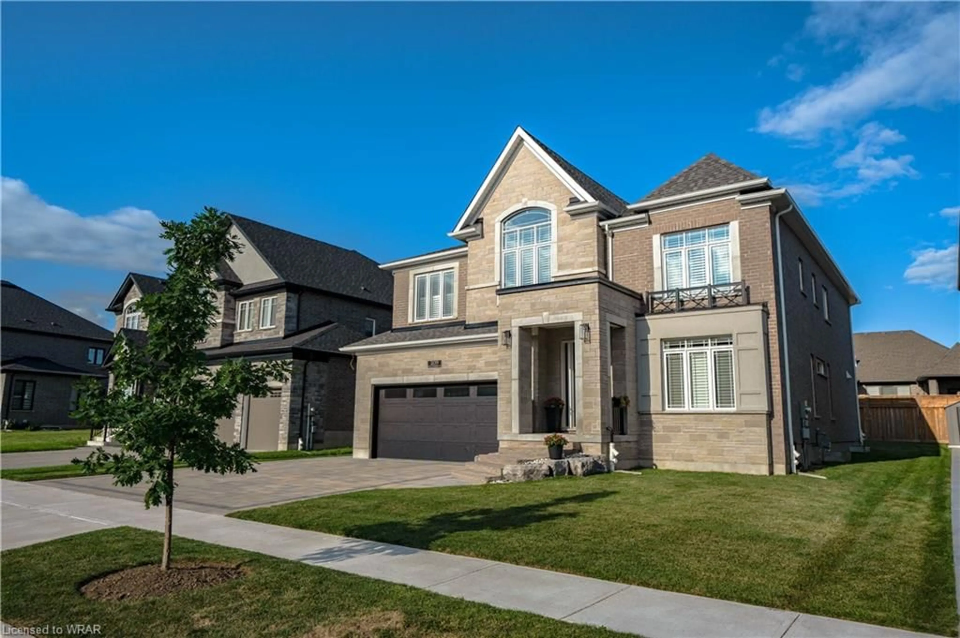 Home with brick exterior material for 209 Field Sparrow Cres, Kitchener Ontario N2K 0G1