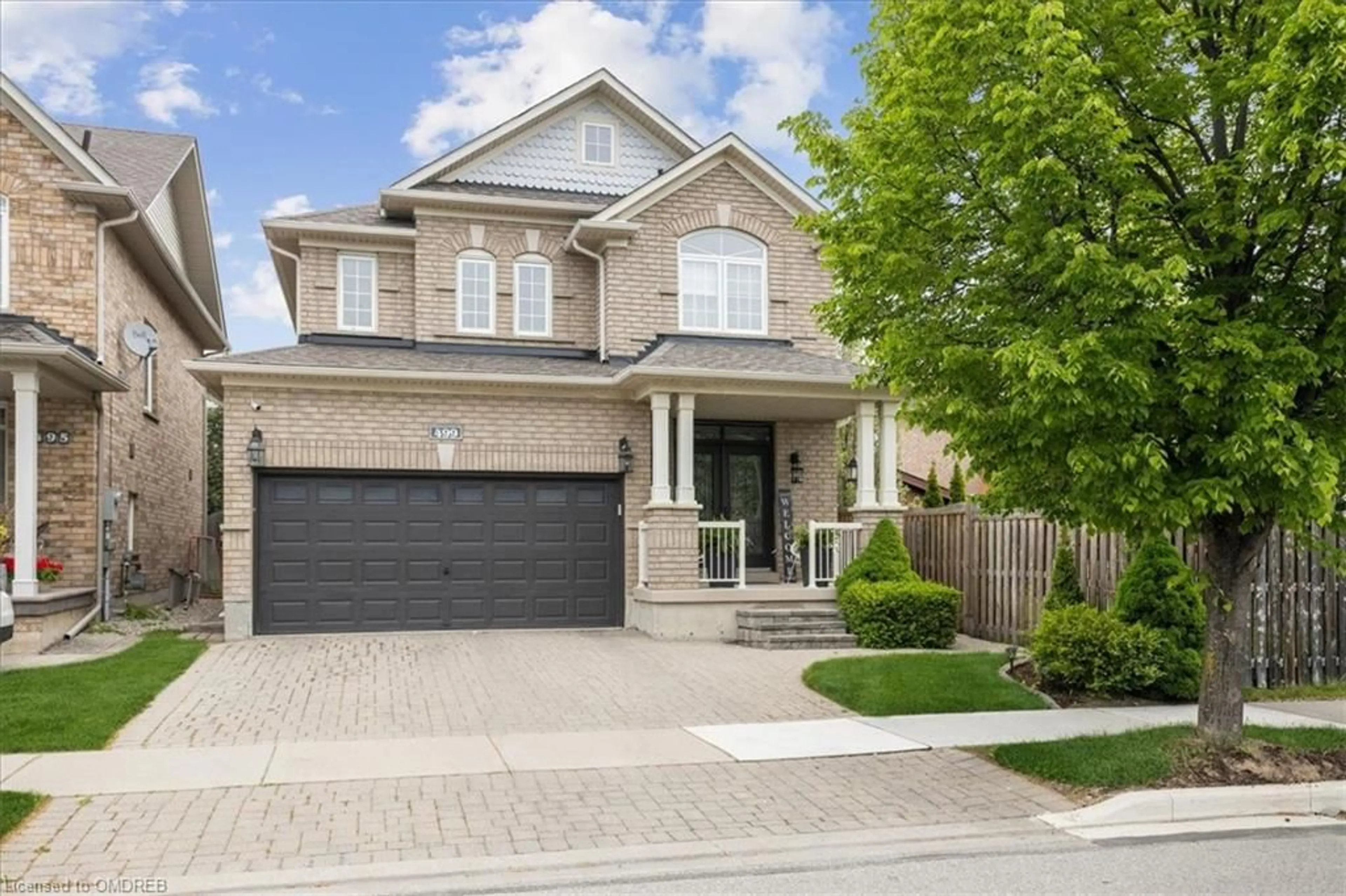 Home with brick exterior material for 499 Willmott Cres, Milton Ontario L9T 6P1
