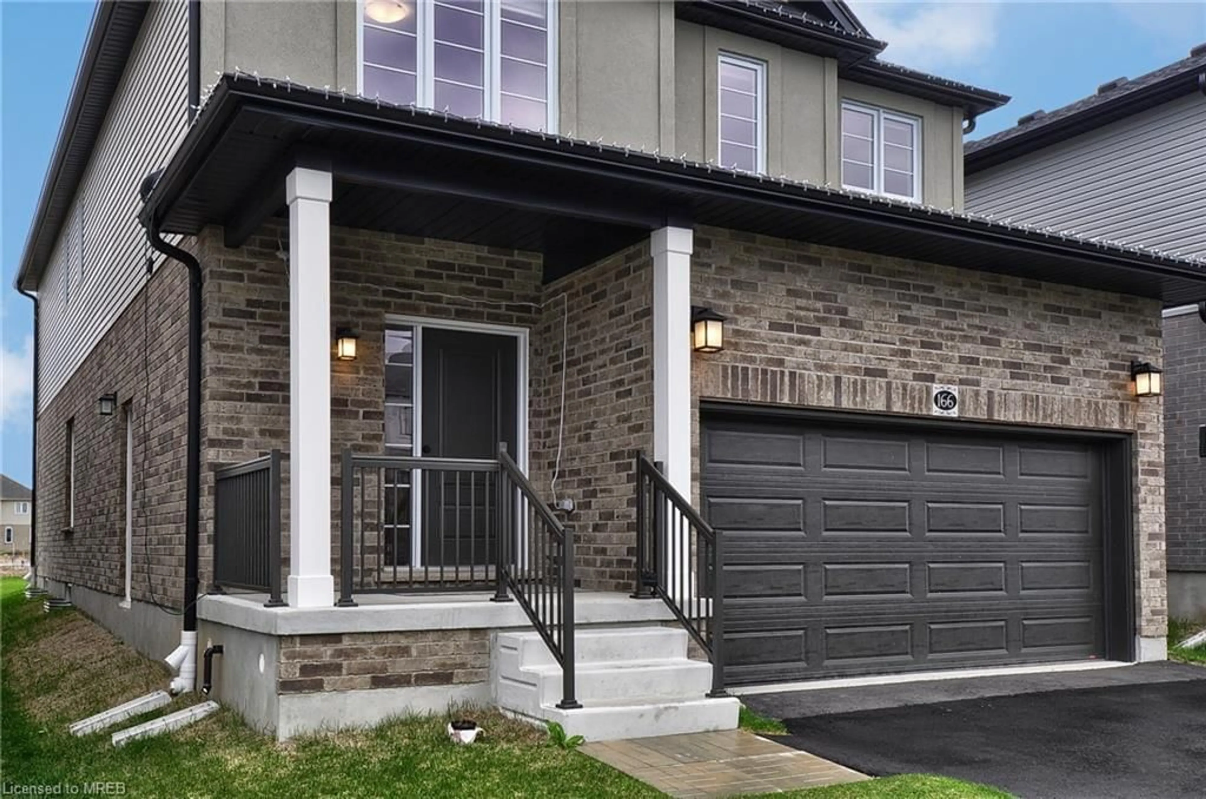 Home with brick exterior material for 166 Savannah Ridge, Paris Ontario N3L 0G5