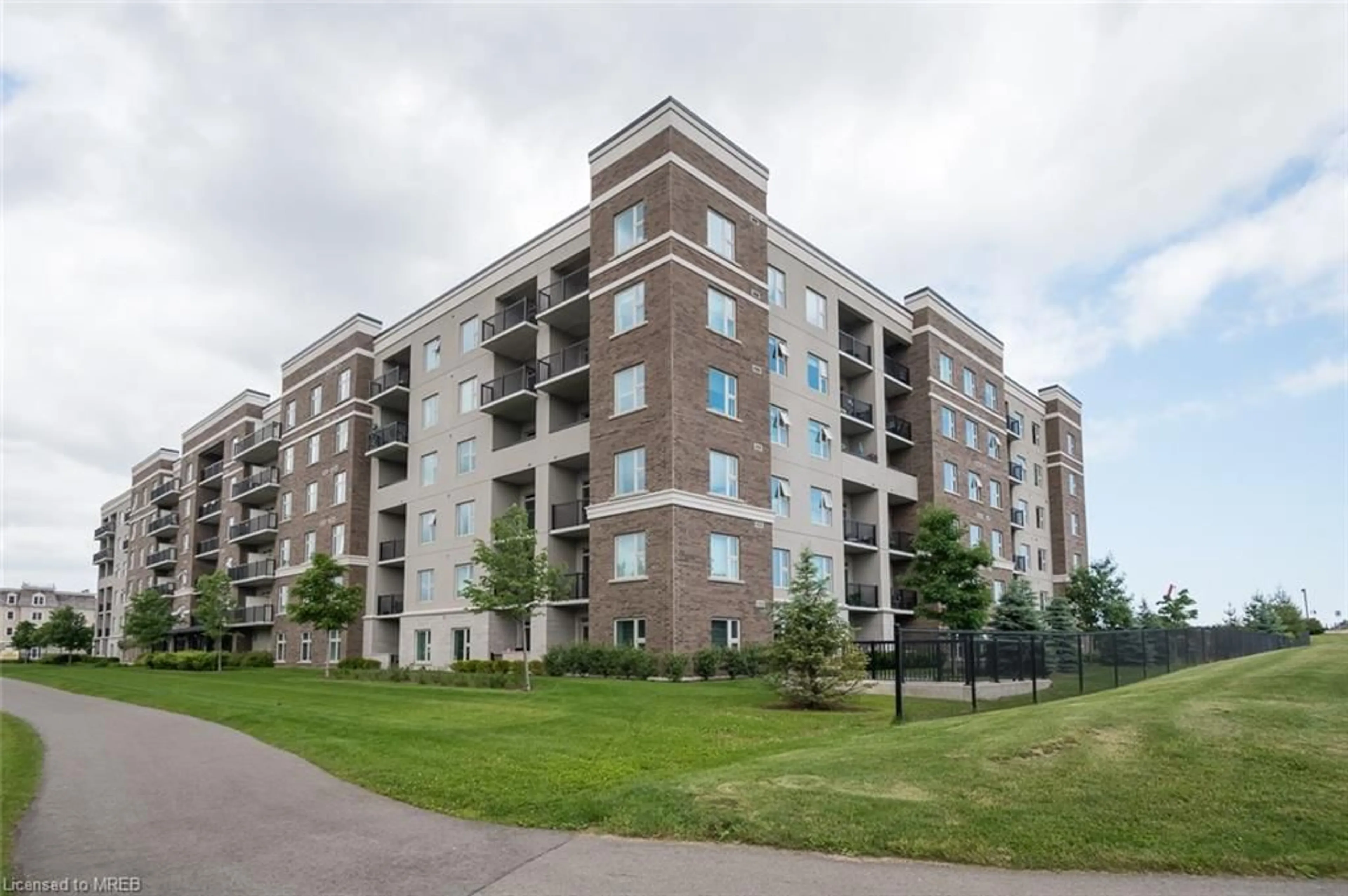 A pic from exterior of the house or condo for 610 Farmstead Dr #508, Milton Ontario L9T 8X5