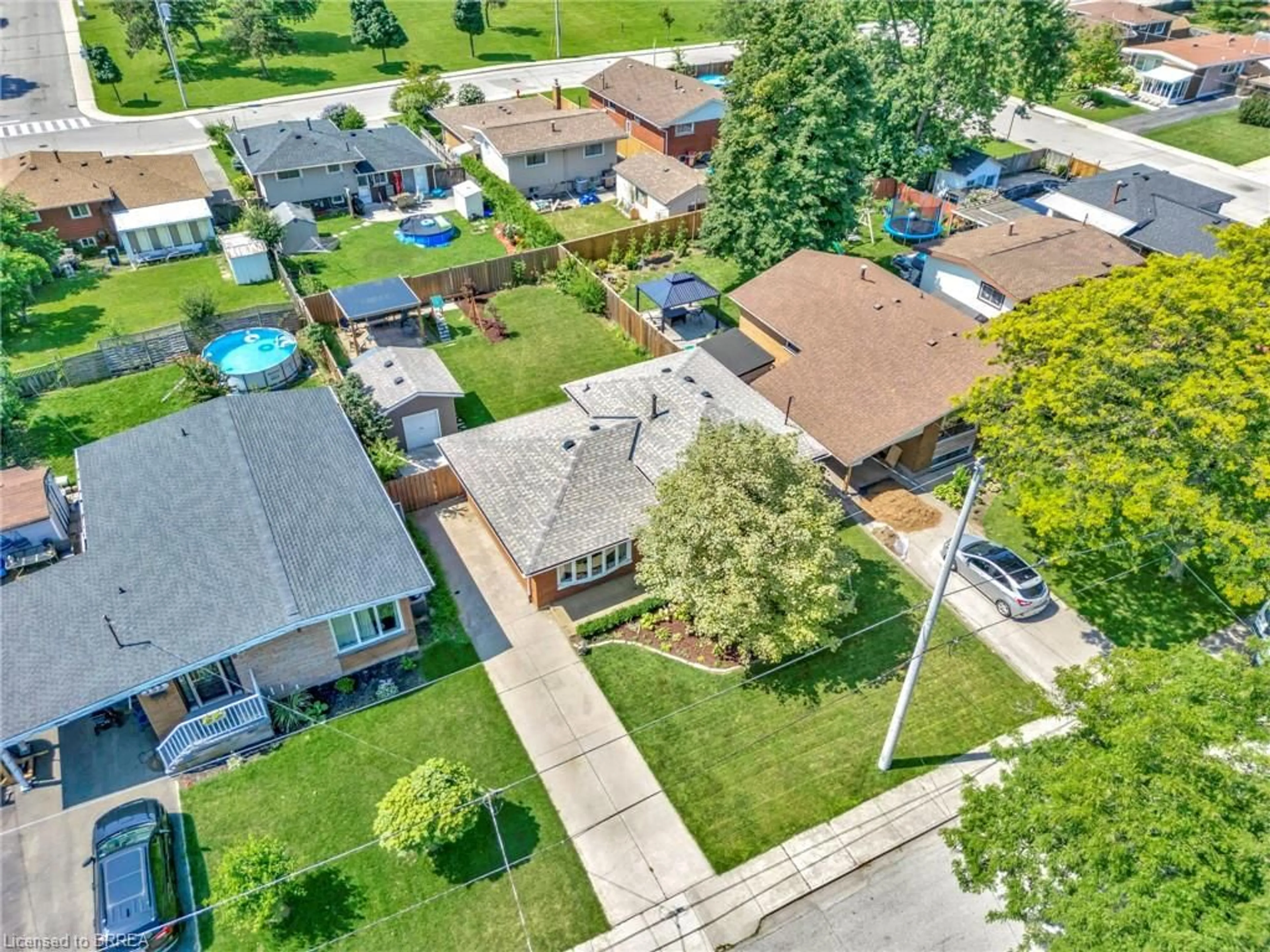 Frontside or backside of a home, the fenced backyard for 157 Fielding Cres, Hamilton Ontario L8V 2P7