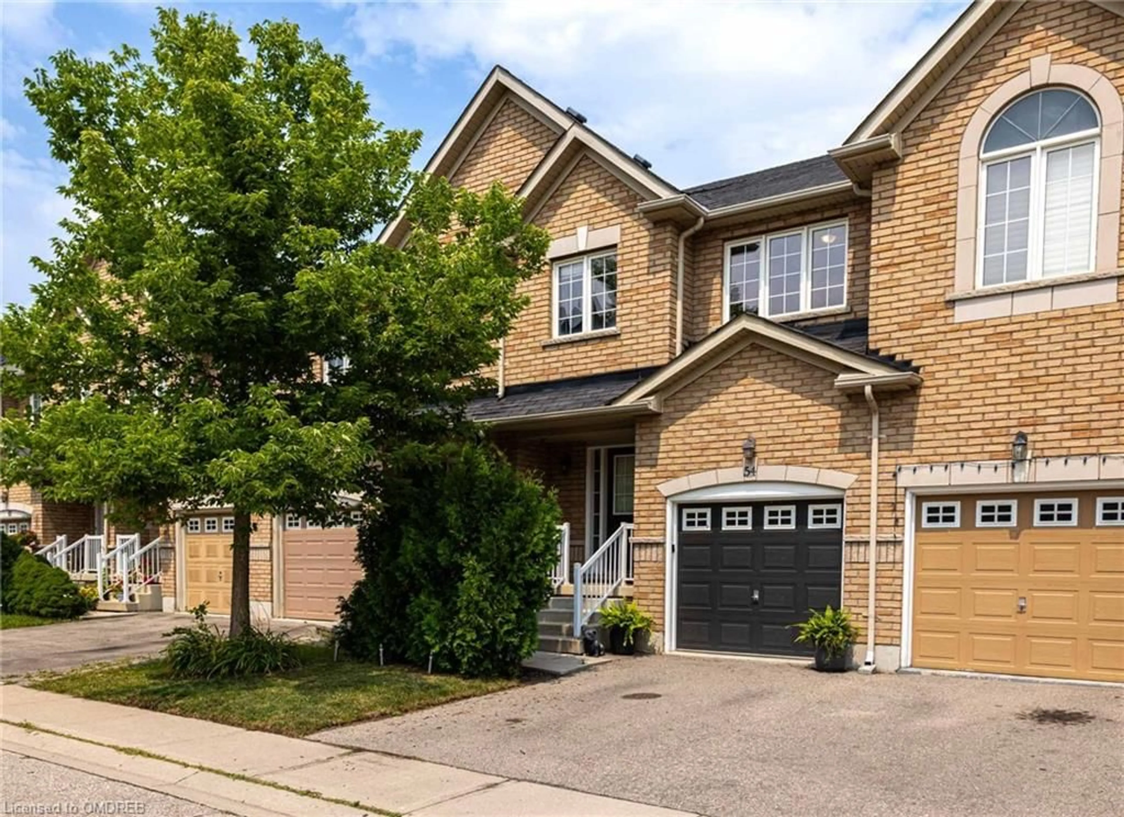 Home with brick exterior material for 620 Ferguson Dr #54, Milton Ontario L9T 0M7