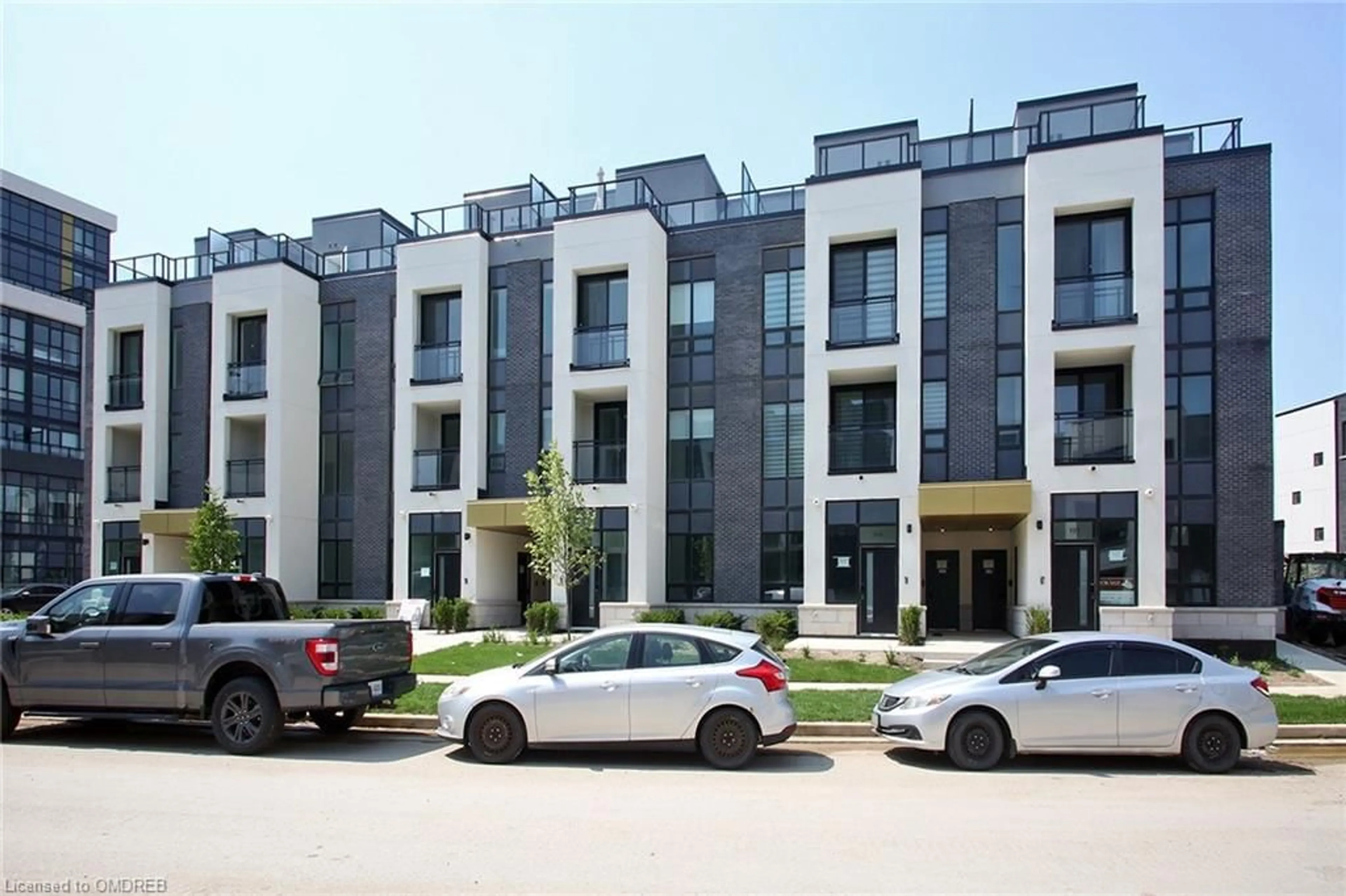 A pic from exterior of the house or condo for 3020 Trailside Dr #135, Oakville Ontario L6M 4M2