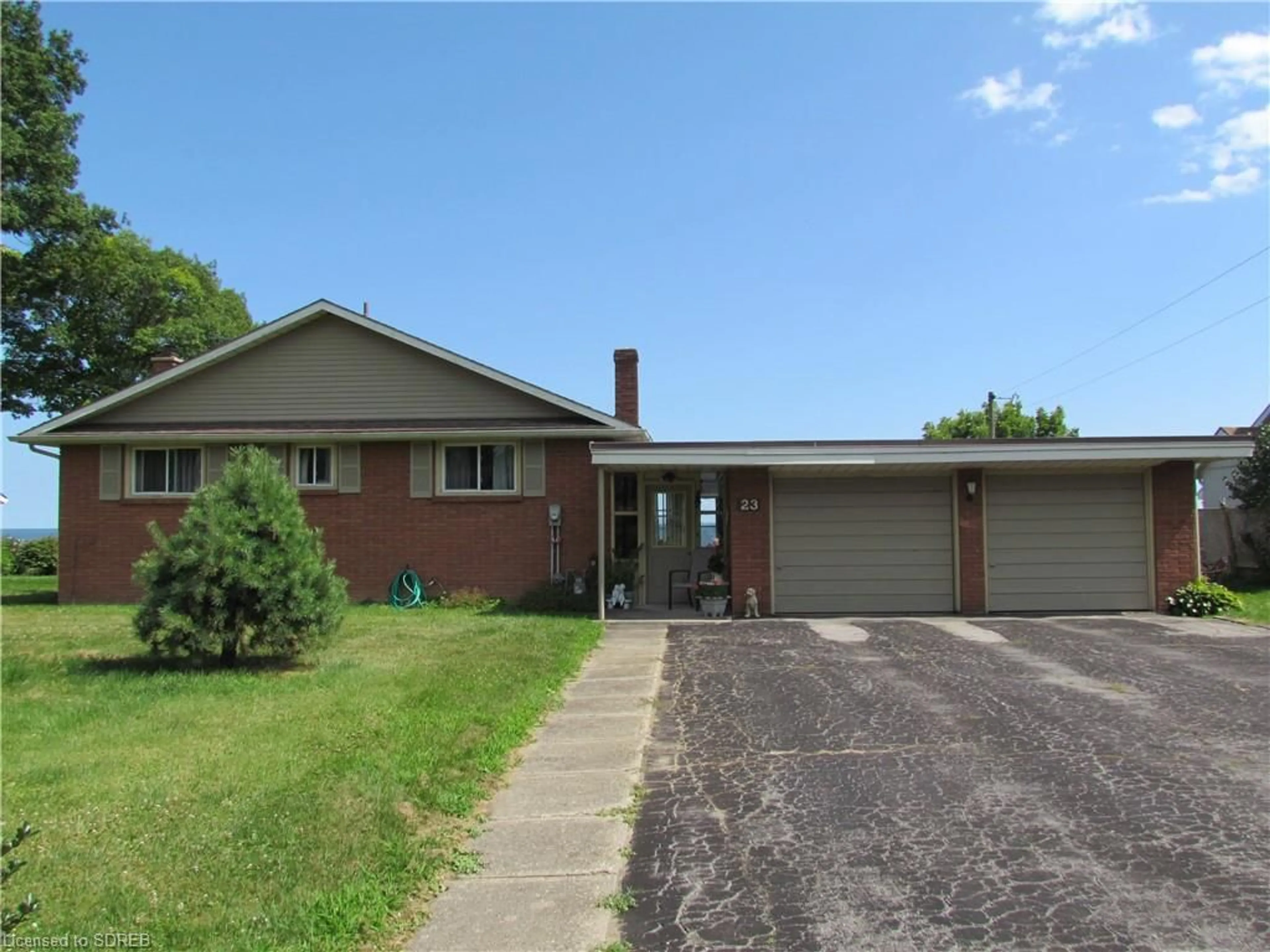 Frontside or backside of a home for 23 Bee St, St. Williams Ontario N0E 1P0