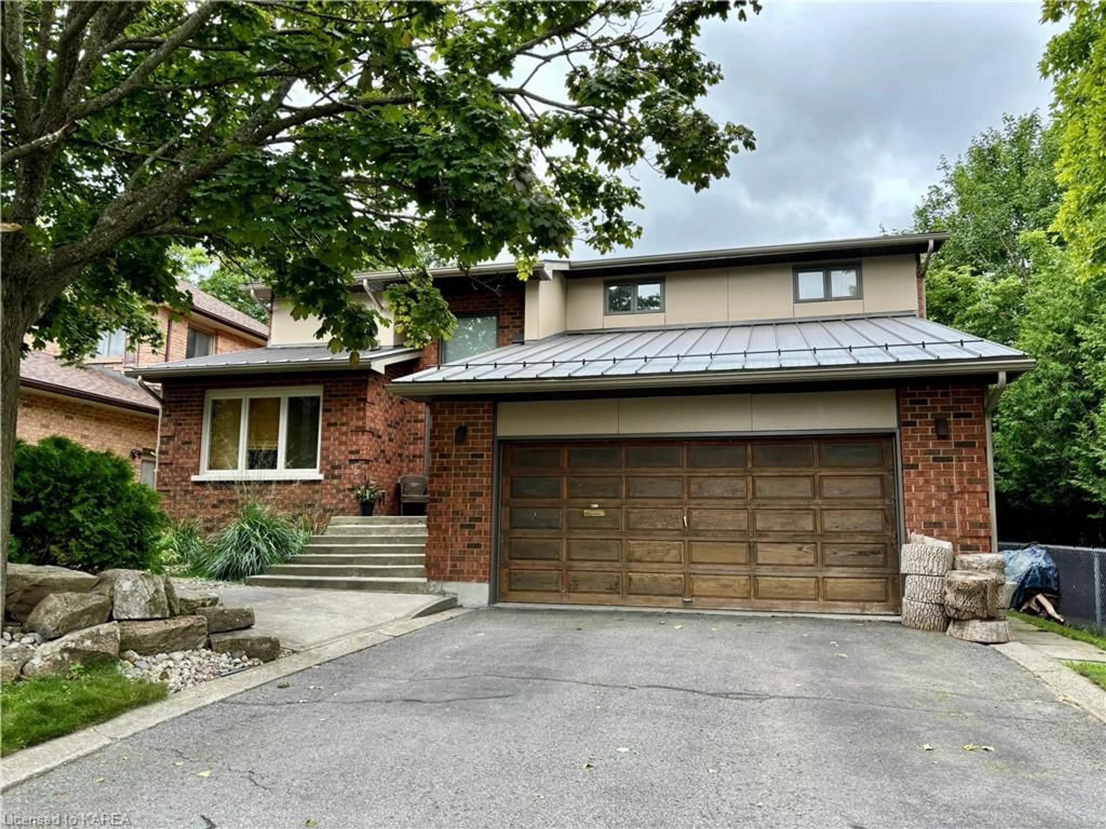 Home with brick exterior material for 973 Auden Pk, Kingston Ontario K7M 7T9