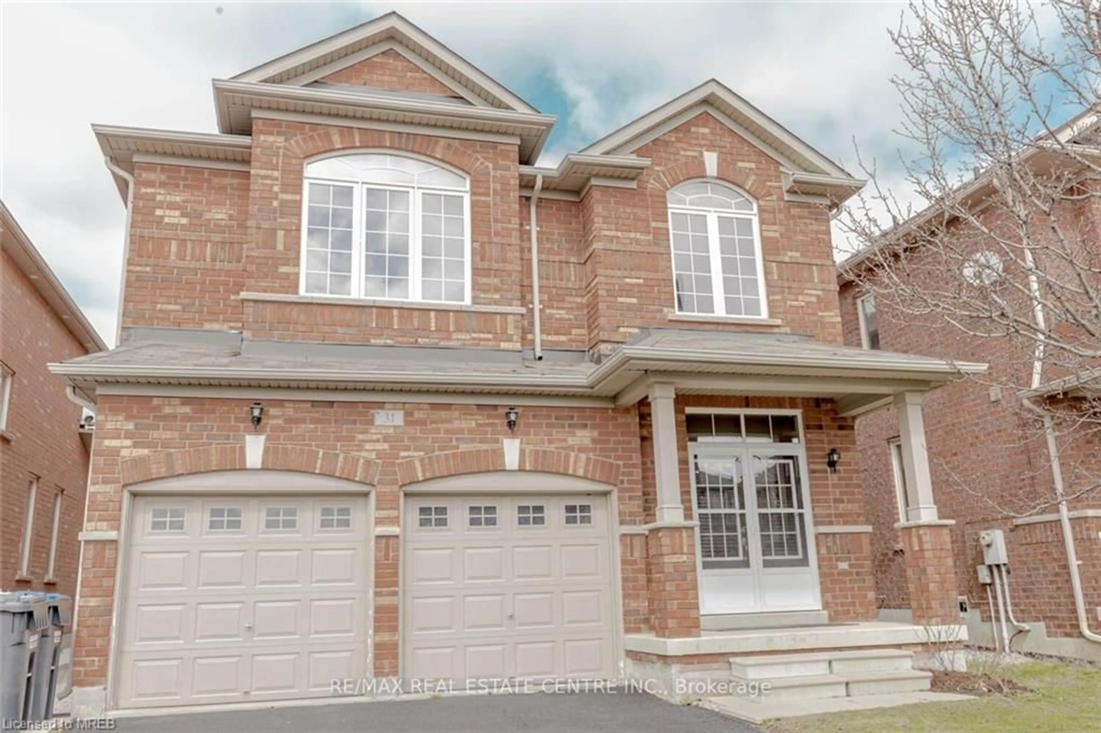 Home with brick exterior material for 31 Amaranth Cres, Brampton Ontario L7A 0L7