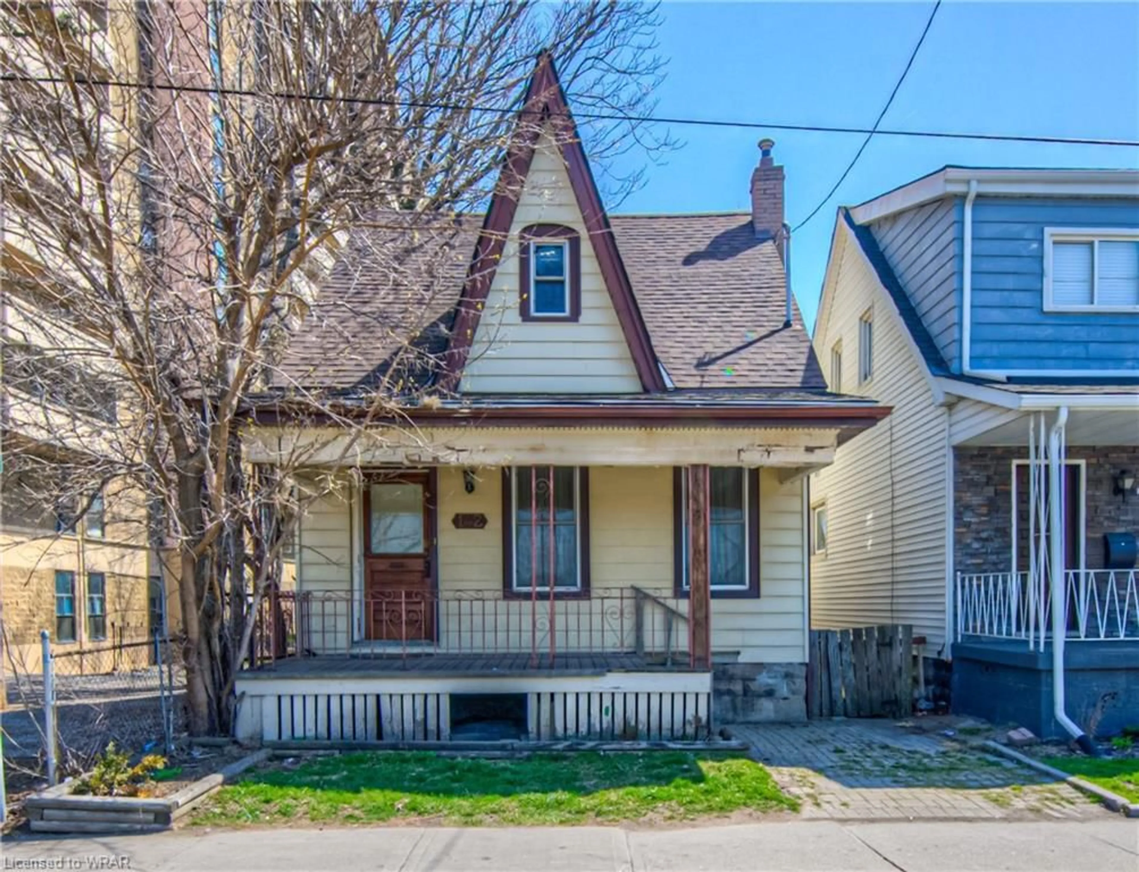 Frontside or backside of a home for 142 Sanford Ave, Hamilton Ontario L8L 5Z5