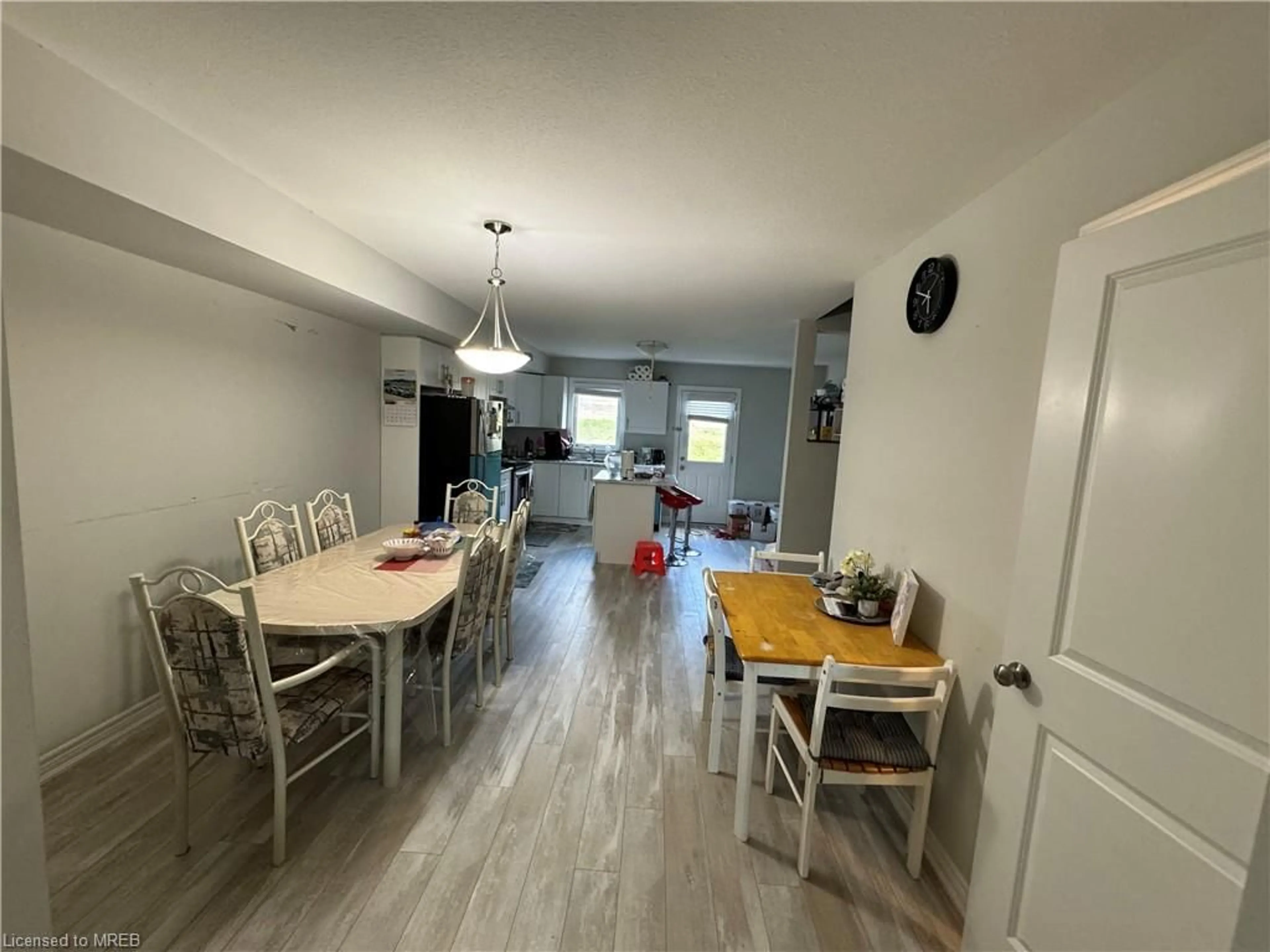 Dining room, wood floors, cottage for 7768 Ascot Circle Cir #64, Niagara Falls Ontario L2H 3P9