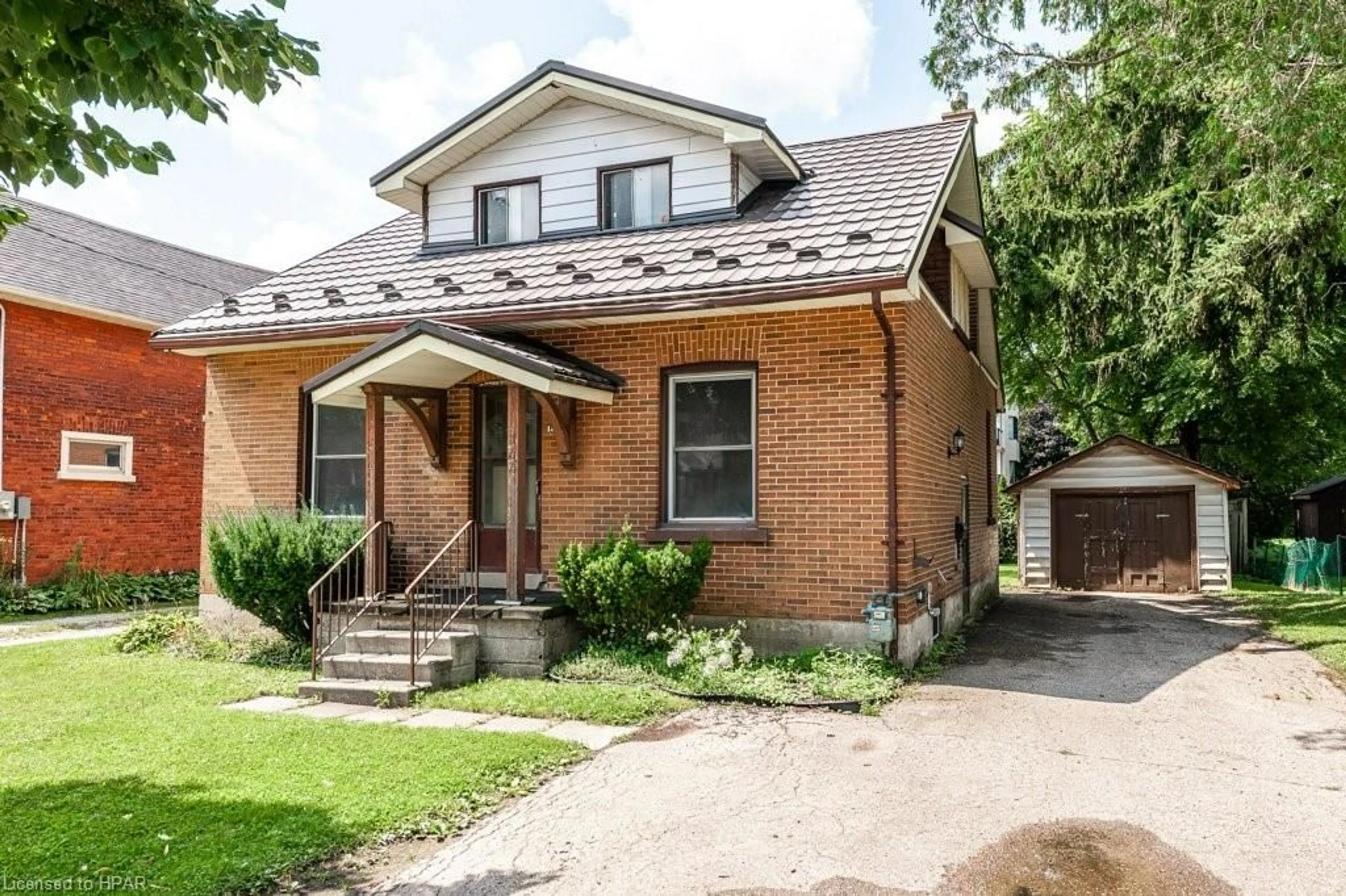 Home with brick exterior material for 144 Romeo St, Stratford Ontario N5A 4S9