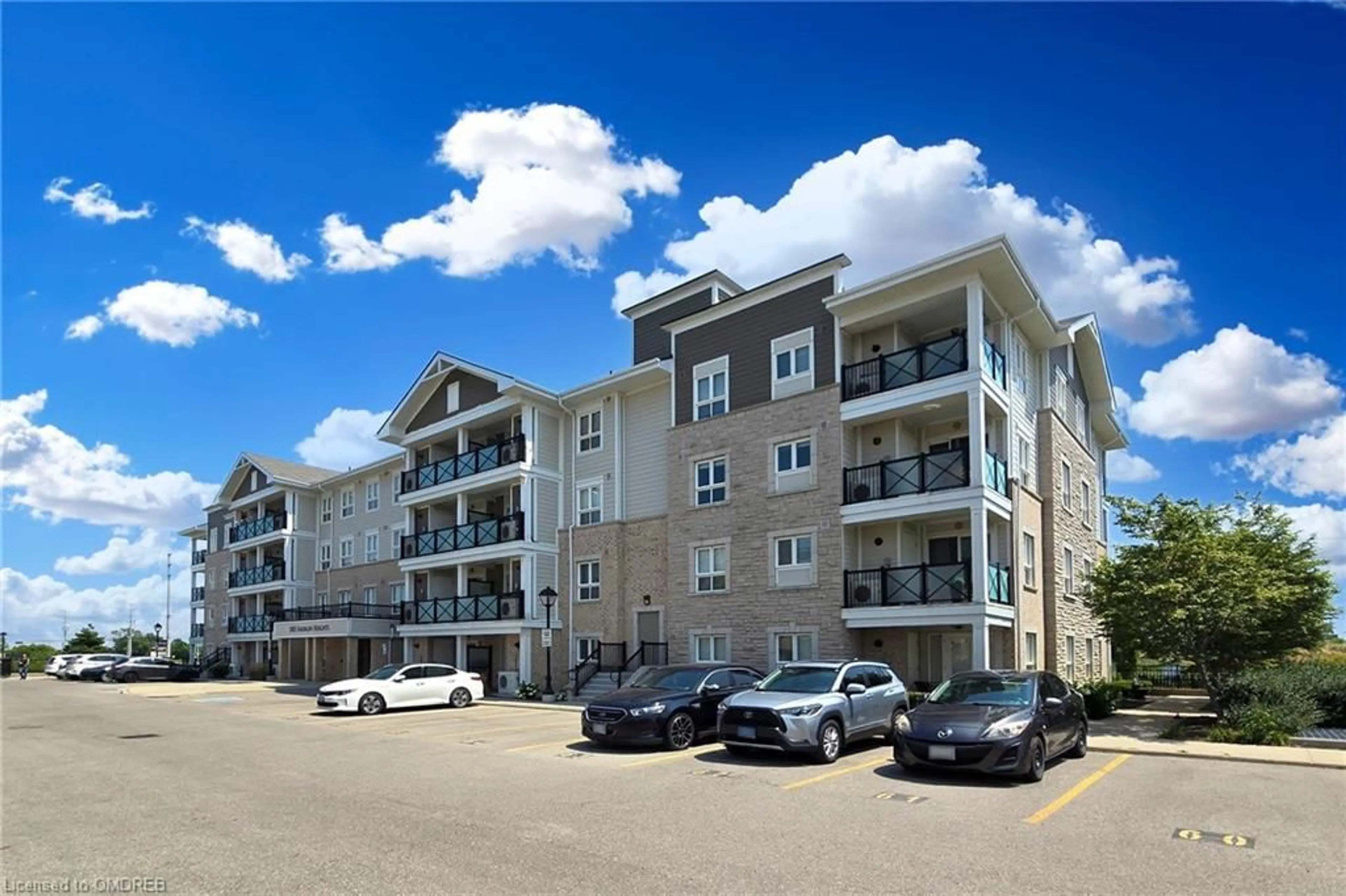 A pic from exterior of the house or condo for 1005 Nadalin Hts #305, Milton Ontario L9T 8R4