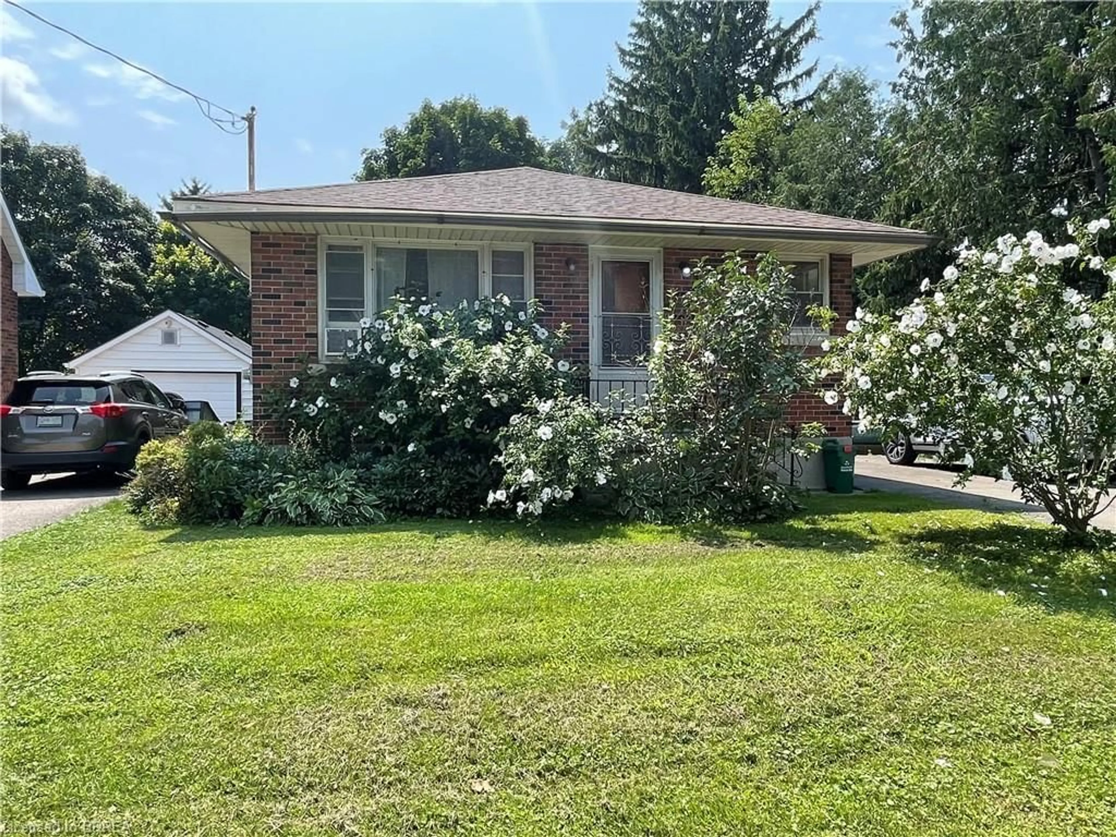 Frontside or backside of a home for 24 Henry St, Brantford Ontario N3R 1Z8