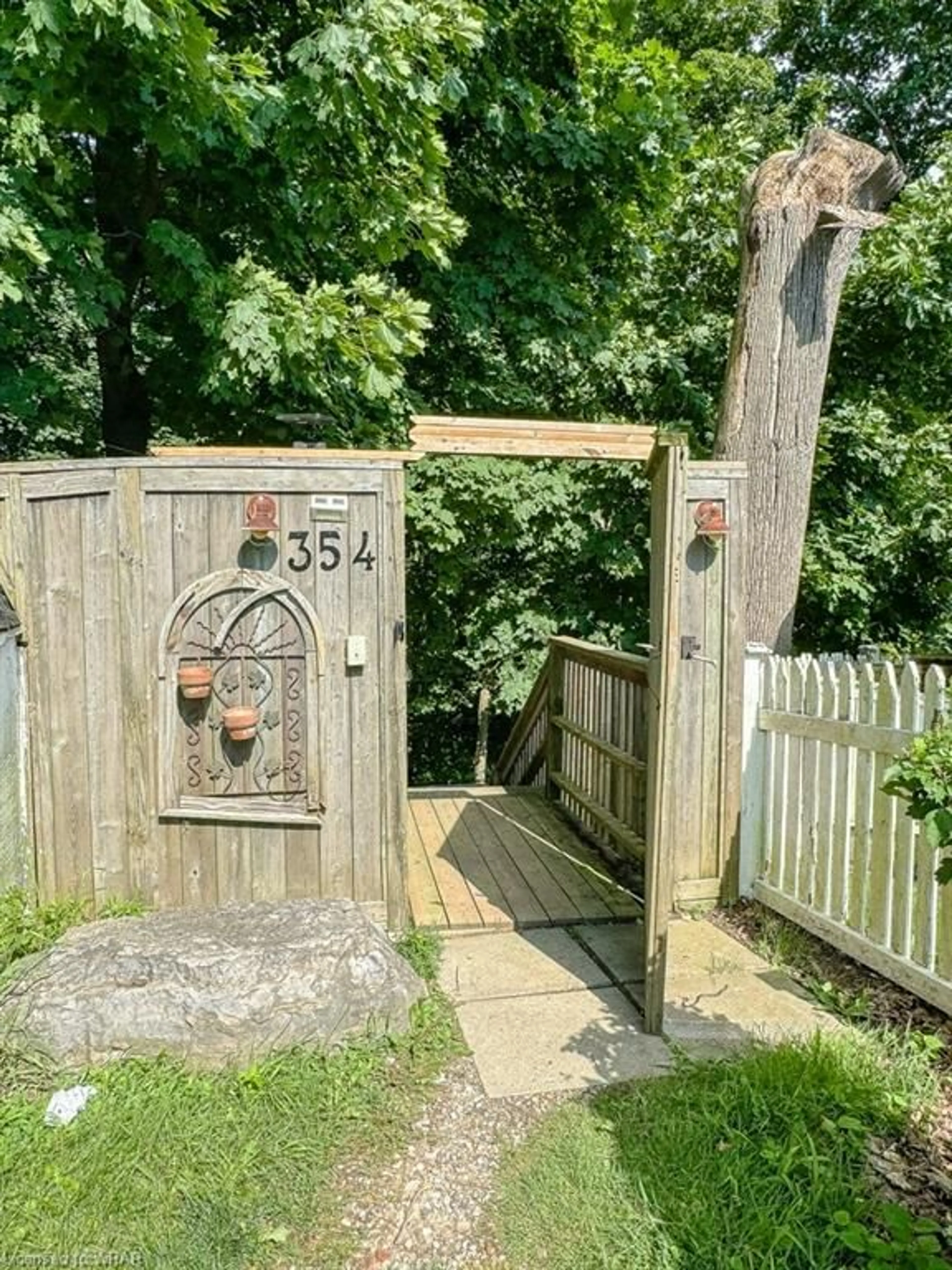 Patio, the fenced backyard for 354 Erie St, Port Stanley Ontario N5L 1E9