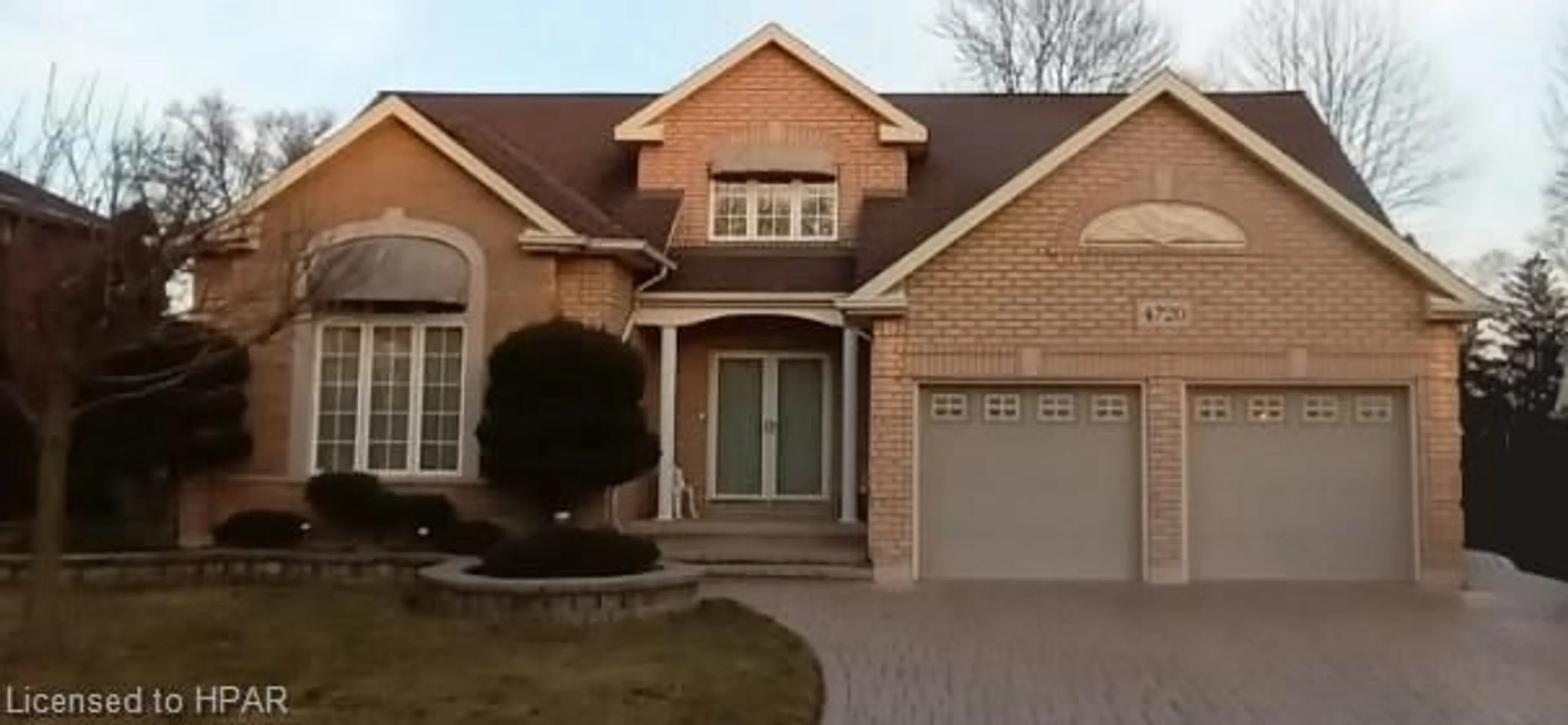 Home with brick exterior material for 4720 Wembley Crt, Windsor Ontario N9G 2P8