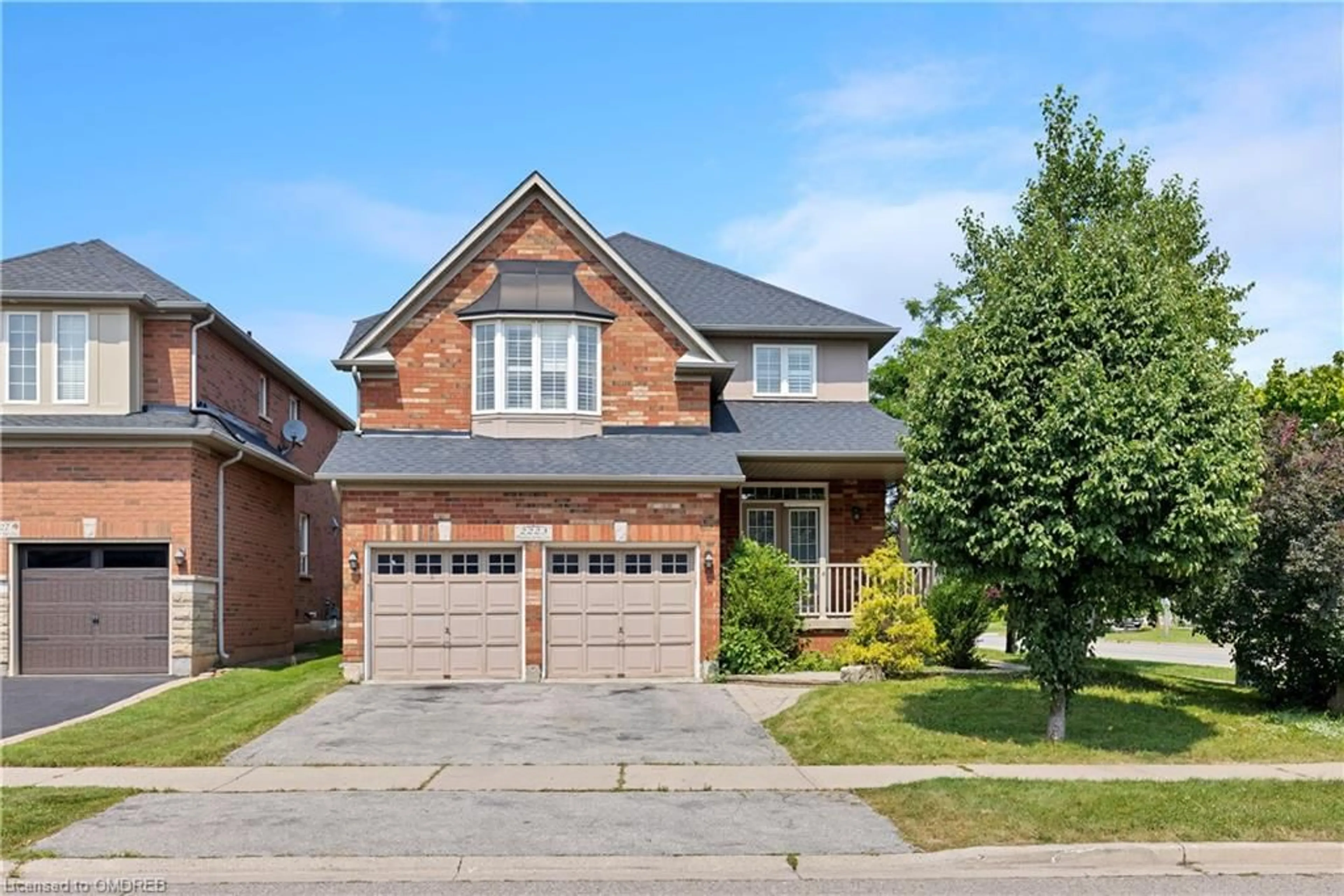 Home with brick exterior material for 2223 Whistling Springs Cres, Oakville Ontario L6M 5G5