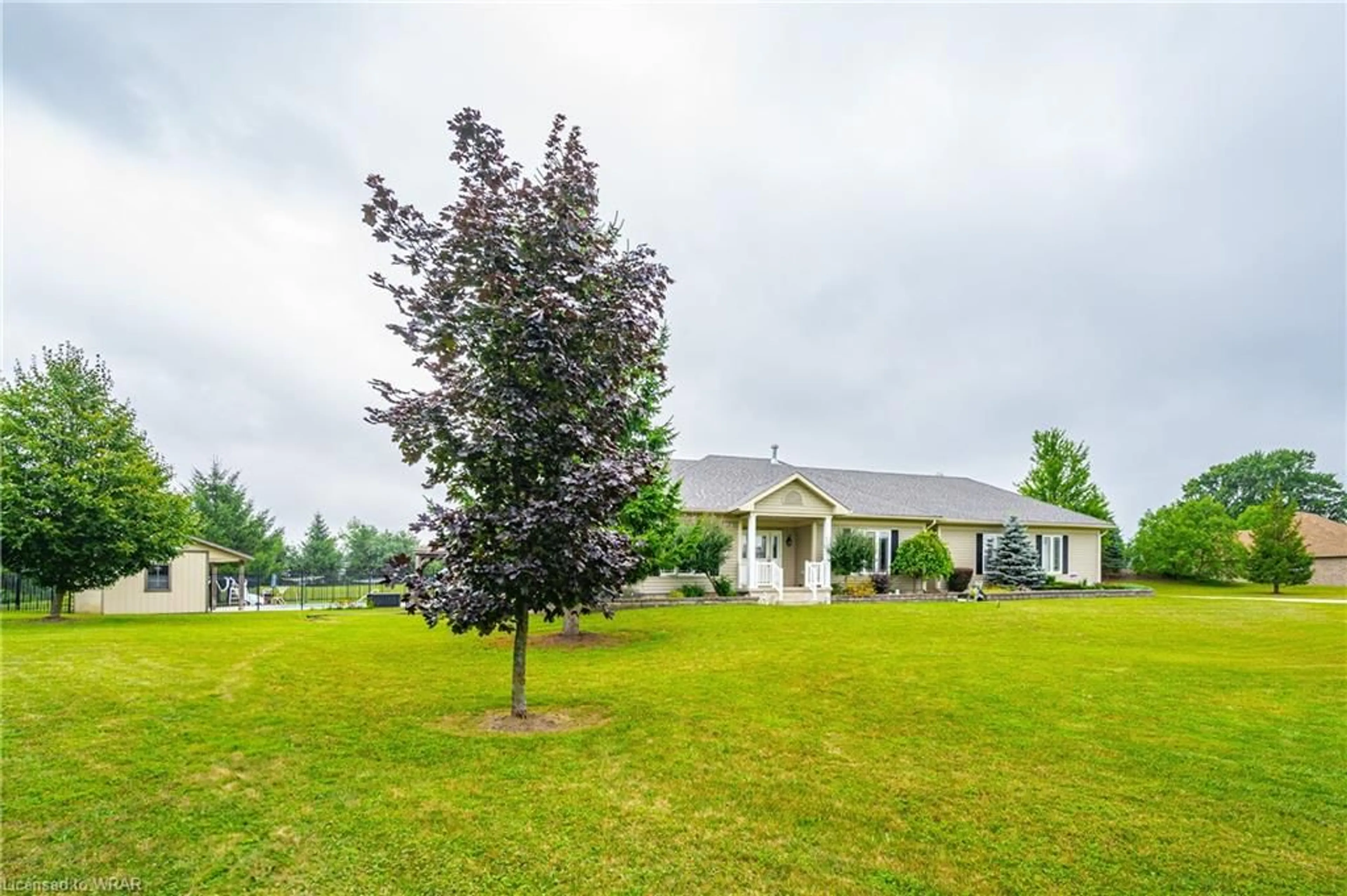 A pic from exterior of the house or condo, the fenced backyard for 27 Highland Rd, Clifford Ontario N0G 1M0