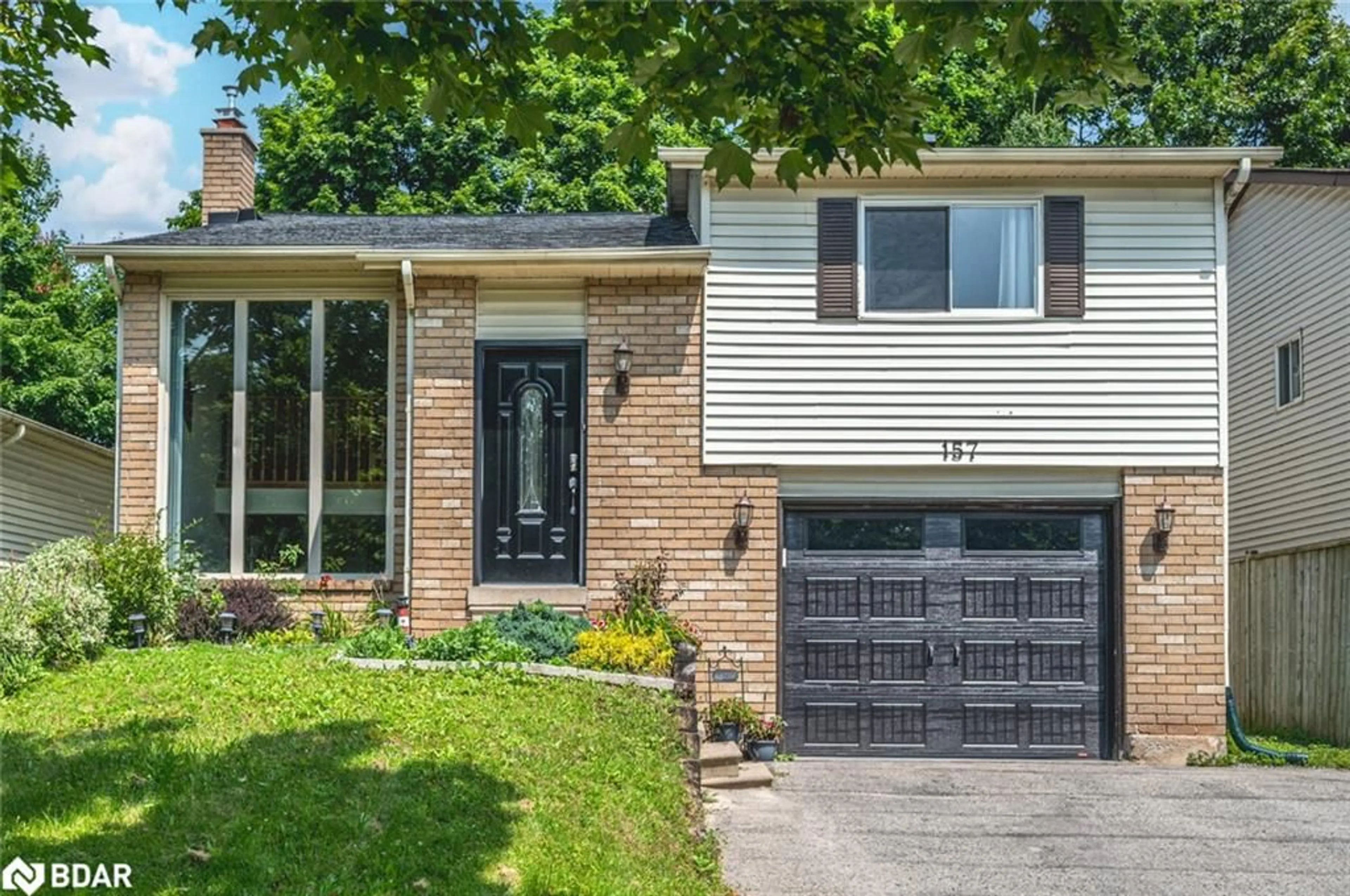 Home with brick exterior material for 157 Hickling Trail, Barrie Ontario L4M 5T6