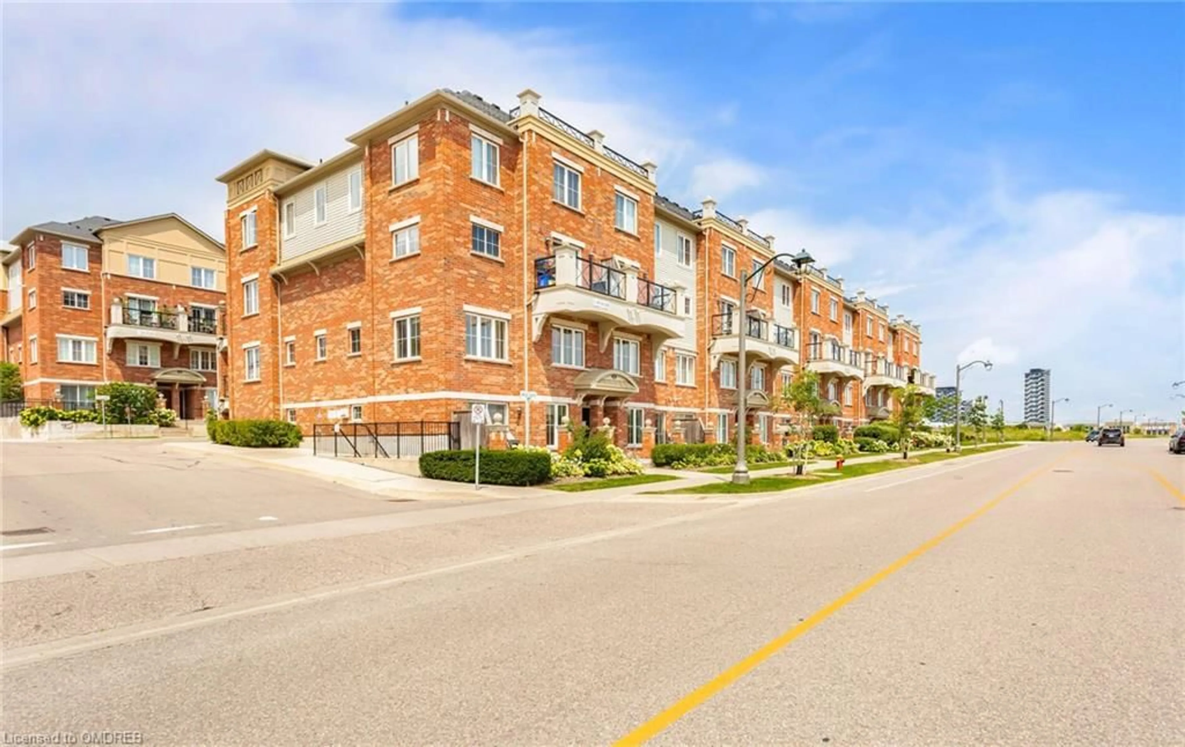 A pic from exterior of the house or condo, the street view for 51 Hays Blvd #10, Oakville Ontario L6H 0J1