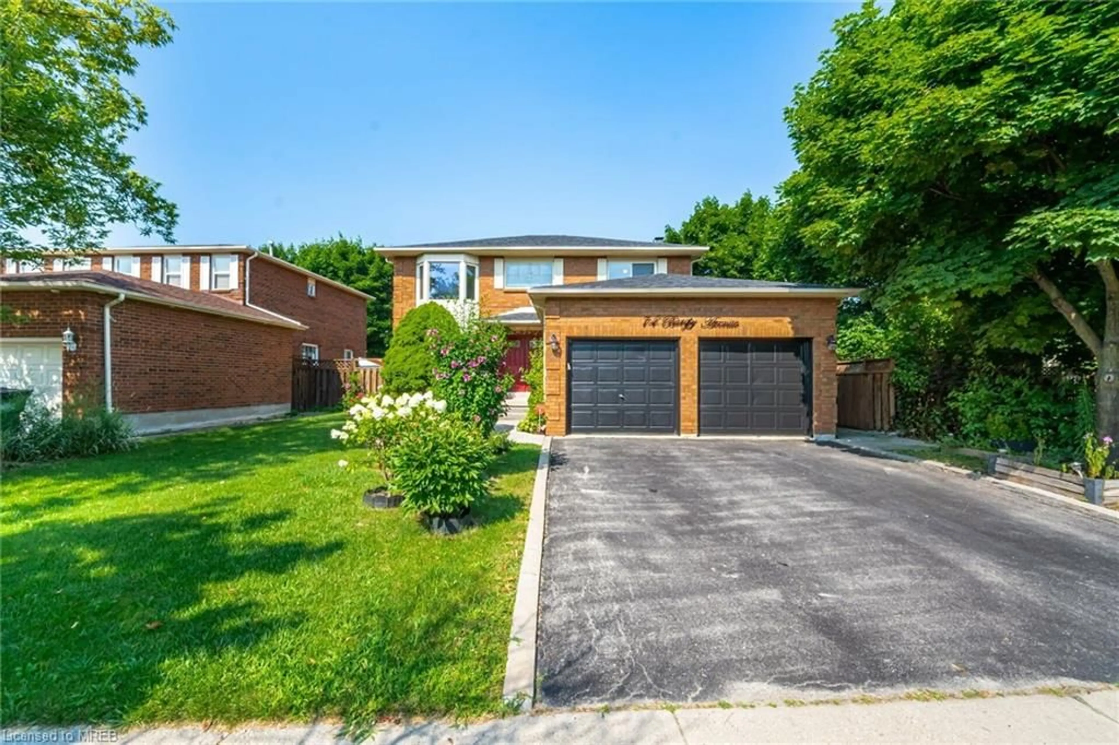 Home with brick exterior material for 74 Burgby Ave, Peel Ontario L6X 3A4